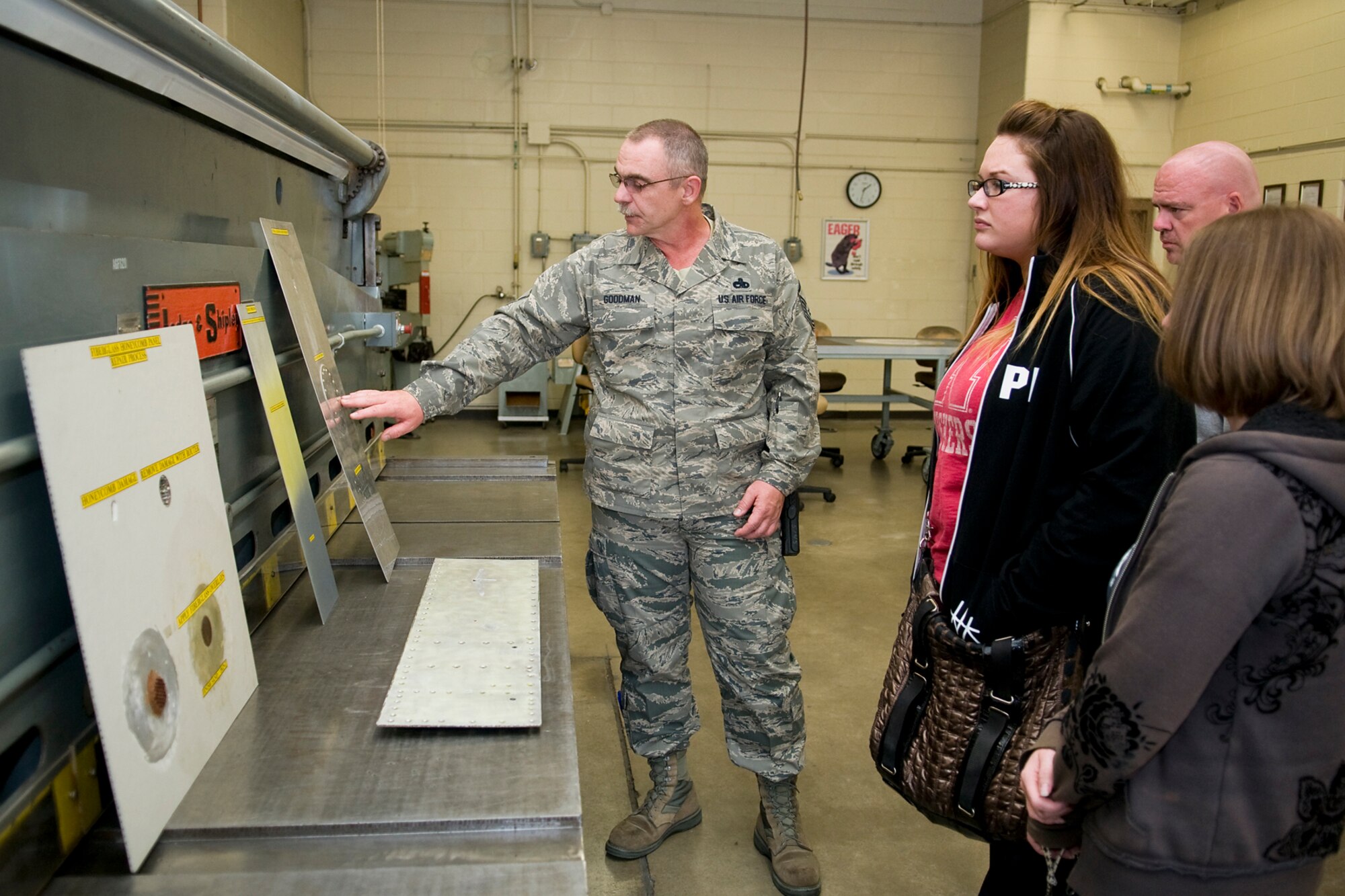 Master Sgt. James F. Goodman Jr., 434th Maintenance Squadron structural maintenance specialist, shows Grissom's honorary commanders how he and other maintainers keep the base's 16 KC-135R Stratotankers structurally sound. The honorary commanders visited the base recently to tour the 434th Maintenance Group. (U.S. Air Force photo/ Tech. Sgt. Mark Orders-Woempner)
