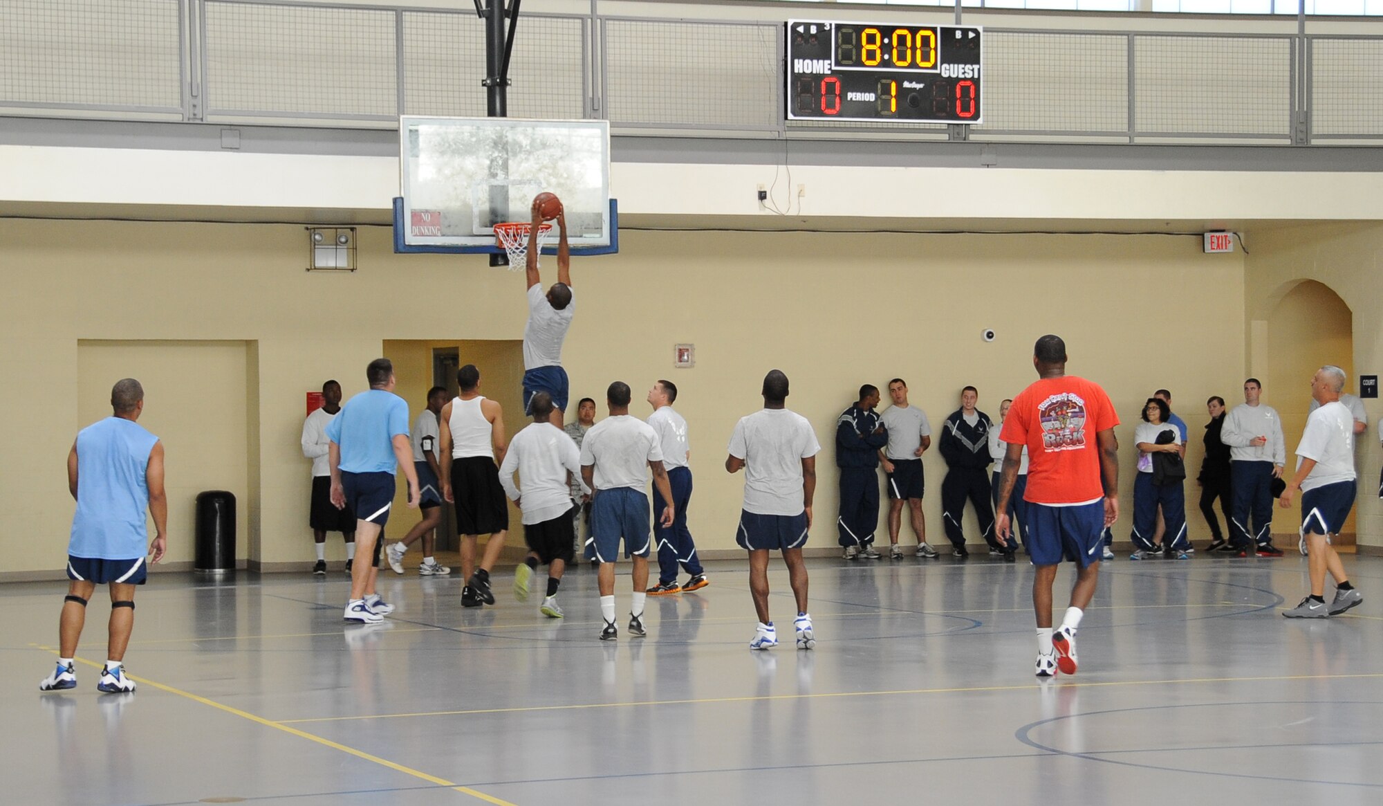 Senior Airman Micaiah Anthony, 2nd Bomb Wing Public Affairs photographer, dunks a basketball during the 2012 Sports Day on Barksdale Air Force Base, La., Nov. 16. Sports Day gave Airmen the opportunity to compete against other squadrons in friendly competition to build teamwork and increase the awareness of fitness. (U.S. Air Force photo/Airman 1st Class Benjamin Gonsier)(RELEASED)
