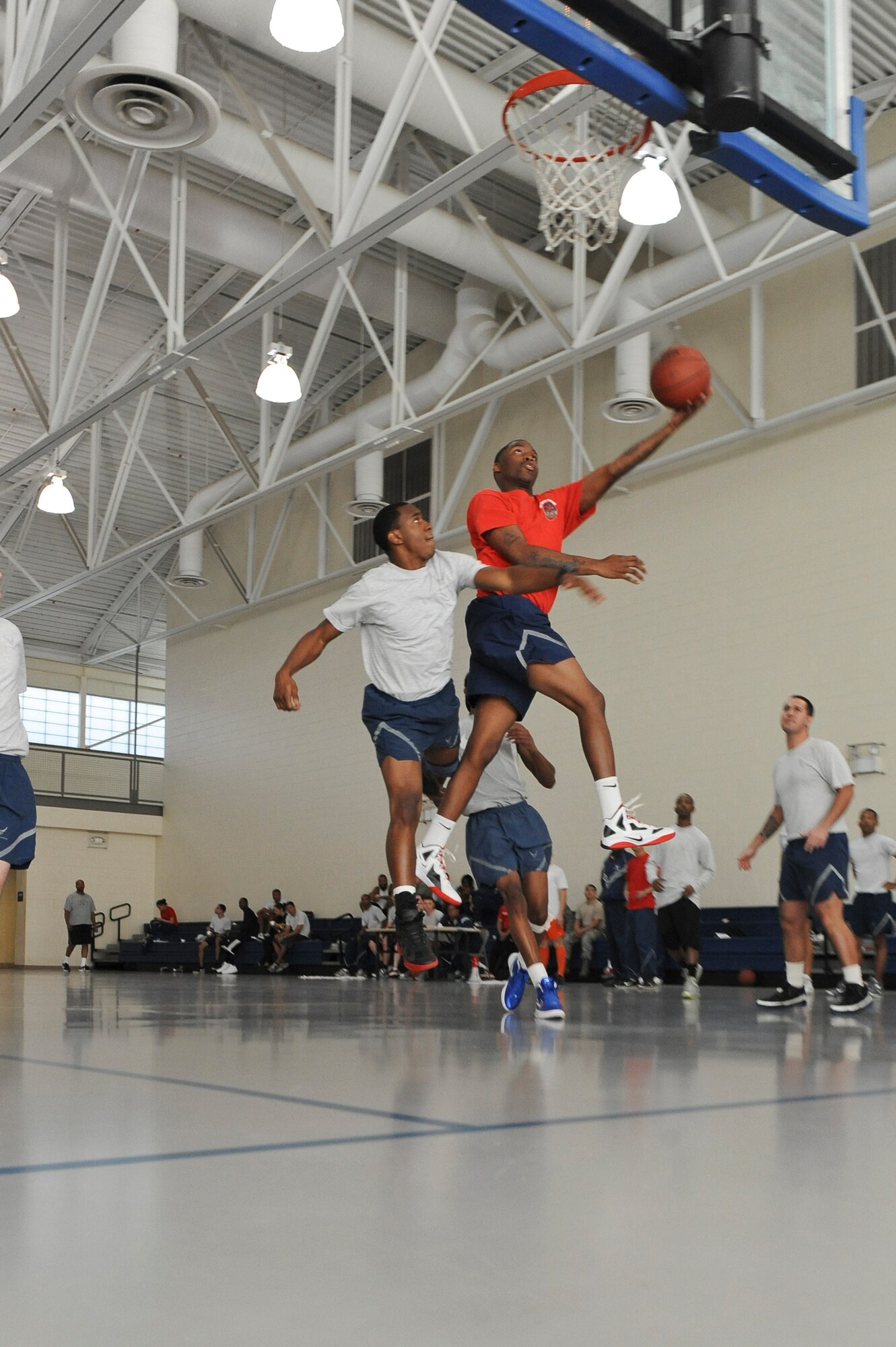 An Airman makes a lay-up during the 2012 Sports Day on Barksdale Air Force Base, La., Nov. 16. The 2nd Force Support Squadron won the Sports Day basketball tournament. Sports Day is comprised of various competitive athletic events to help promote physical fitness. (U.S. Air Force photo/Senior Airman Micaiah Anthony)(RELEASED)