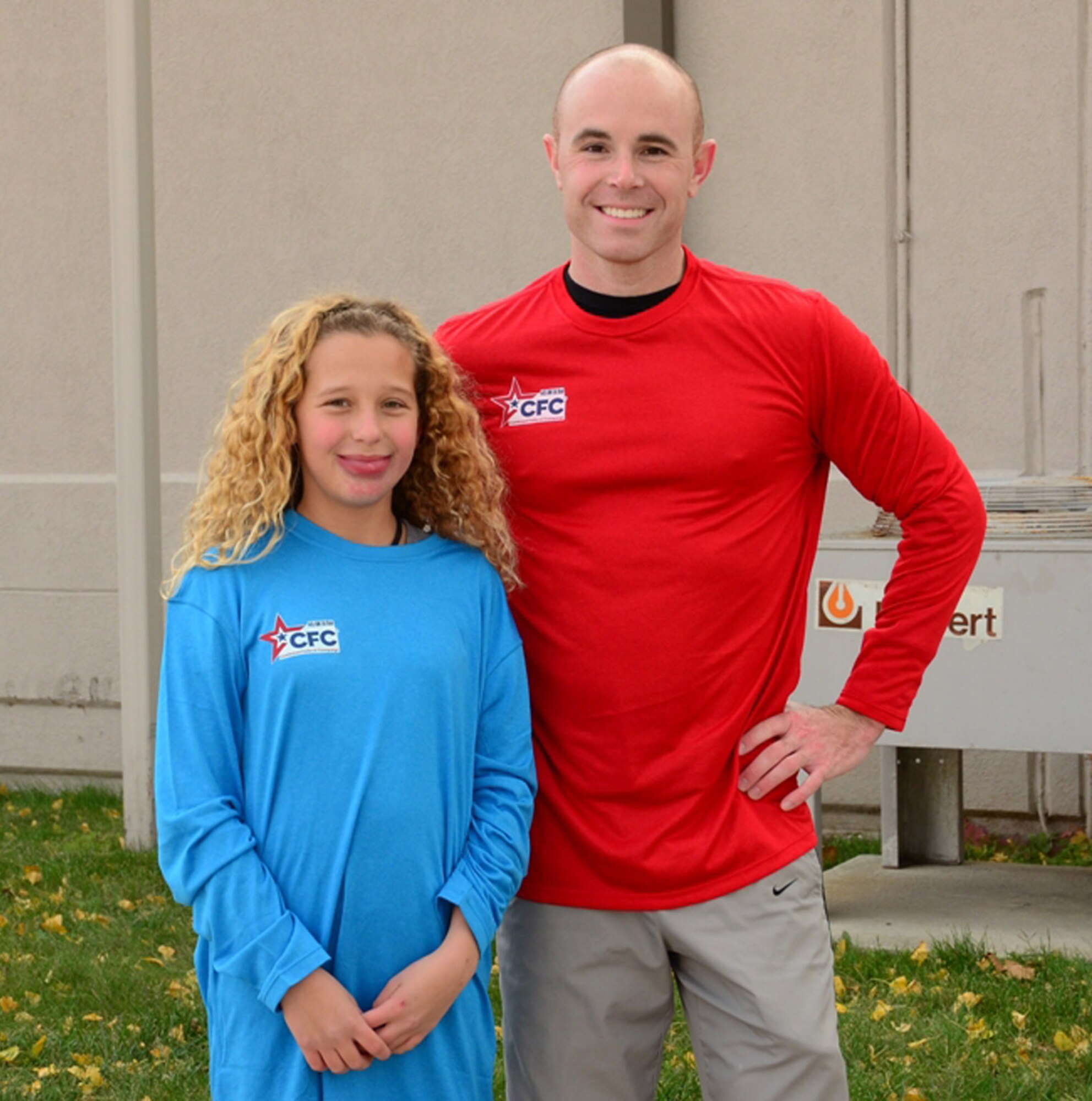 WRIGHT-PATTERSON AIR FORCE BASE, Ohio – Tech. Sgt. Matthew Keechle, 87th Aerial Port Squadron passenger services flight supervisor, won first place in the men’s category and Alora Penner, daughter of Master Sgt. Kerry Penner, 445th Maintenance Group quality assurance inspector, won first place in the women’s category in the 445th Airlift Wing Combined Federal Campaign 5K run Nov. 4. More than 40 runners participated in the event. The wing met its 2012 CFC goal by raising $15,537.90. (U.S. Air Force photo/Staff Sgt. Mikhail Berlin)