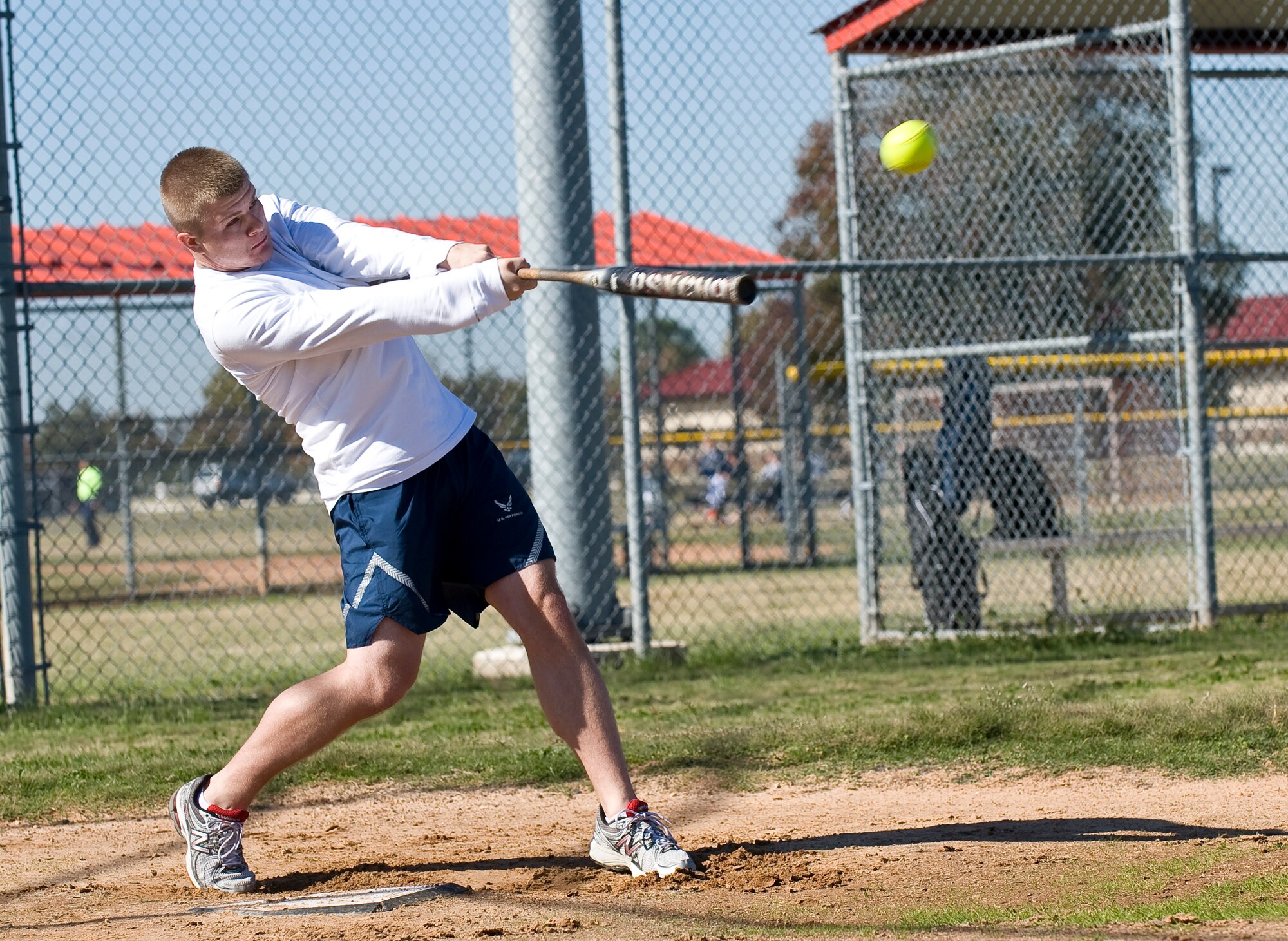 Airman 1st Class Kristopher Tolar, 2nd Contracting Squadron, hits a ball during the homerun derby on Barksdale Air Force Base, La., Nov. 16. The derby was part of the 2012 Sports Day, an annual event that gives Airmen the opportunity to participate in several individual and team sports throughout the day. (U.S. Air Force photo/Staff Sgt. Chad Warren)(RELEASED)