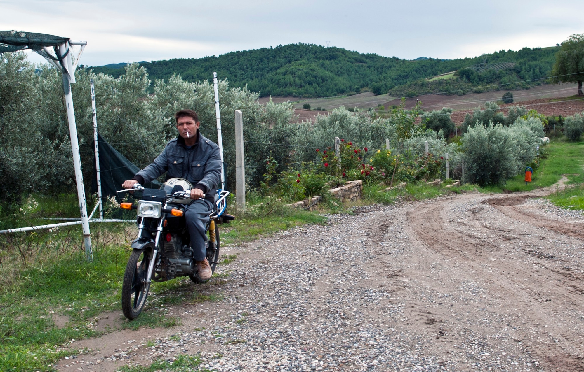 An Ekotepe Organic Farm worker rides up a hill Nov. 11, 2012, near Adana, Turkey. Ekotepe is on top of a hill surrounded by some of the most beautiful country side in Adana. (U.S. Air Force photo by Senior Airman Daniel Phelps/Released)