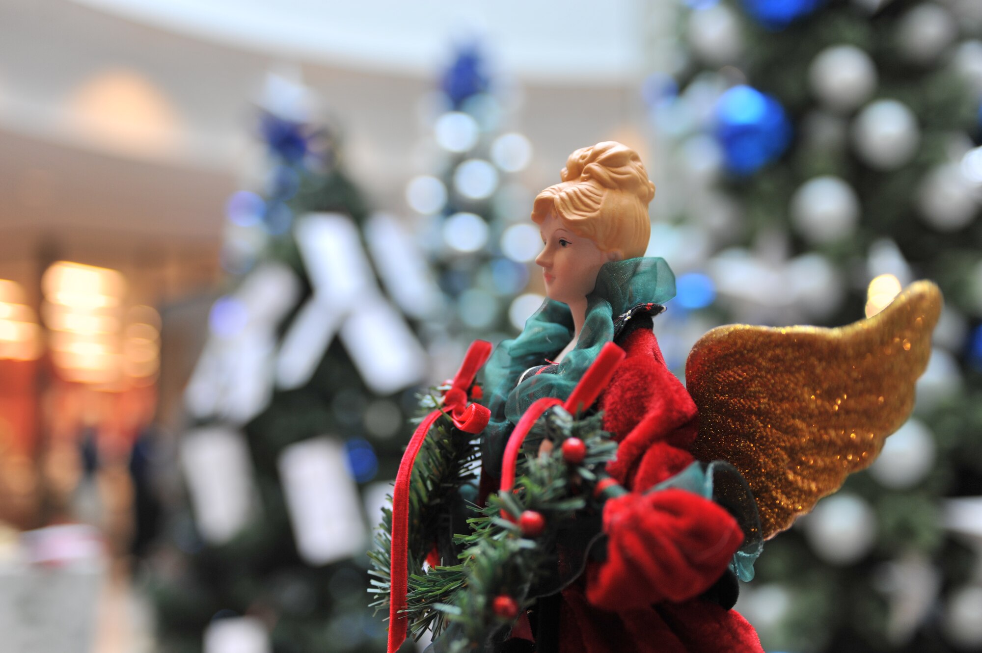 A christmas angel waits to be placed on top of the 2012 Angel Tree in the Kaiserslautern Military Community Center on Ramstein Air Base, Germany, Nov. 16, 2012. The Angel Tree Program helps provide financial relief which helps in the purchase of gifts for children during the holiday season. (U.S. Air Force photo/Senior Airman Caitlin O’Neil-McKeown)

