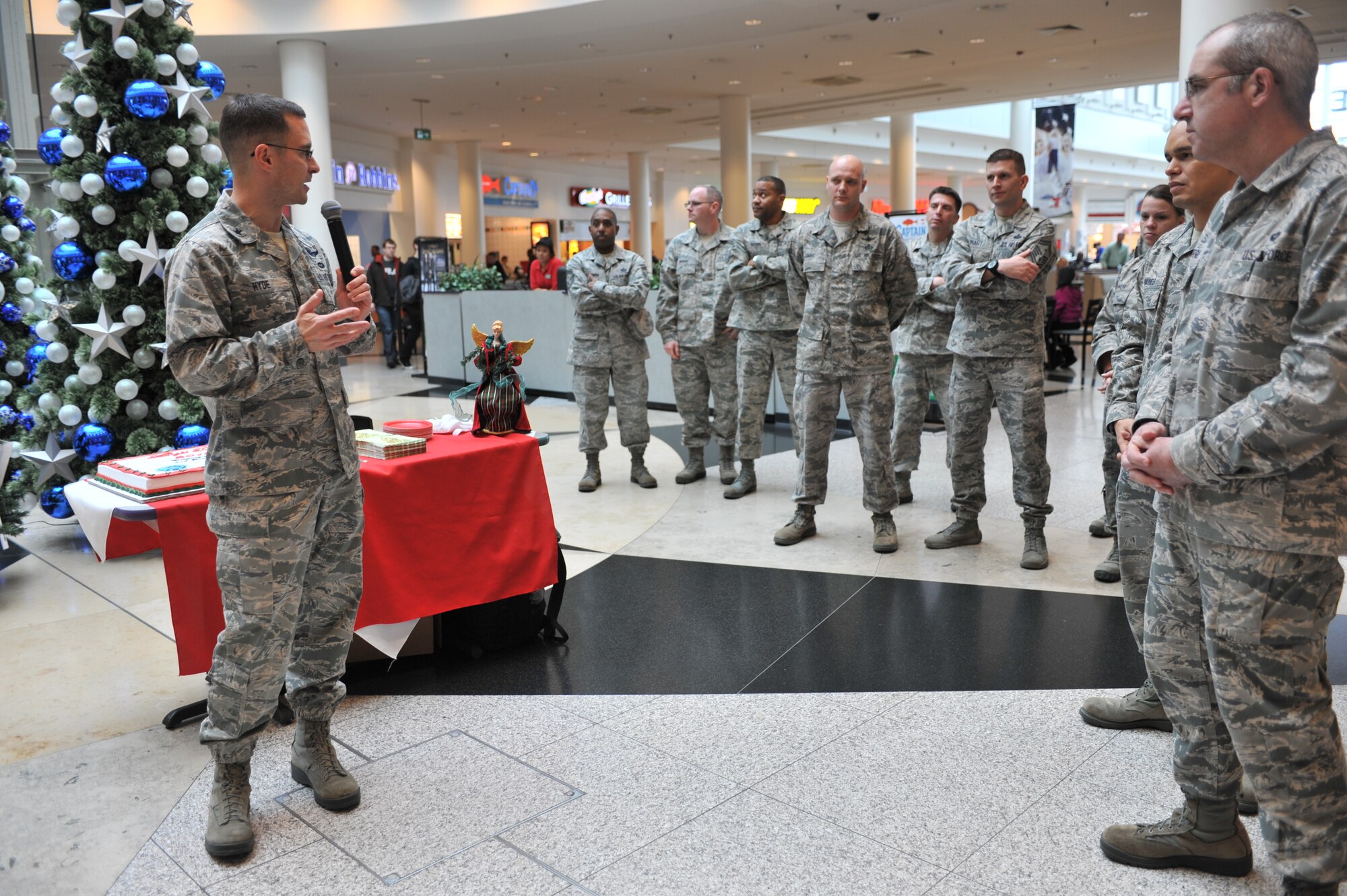 Brig. Gen. C.K. Hyde, 86th Airlift Wing commander, speaks with members of Team Ramstein on the importance of the Angel Tree program on Ramstein Air Base, Germany, Nov. 16, 2012. The Angel Tree program provides financial relief which helps in the purchase of gifts for children during the holiday season. (U.S. Air Force photo/Senior Airman Caitlin O’Neil-McKeown)