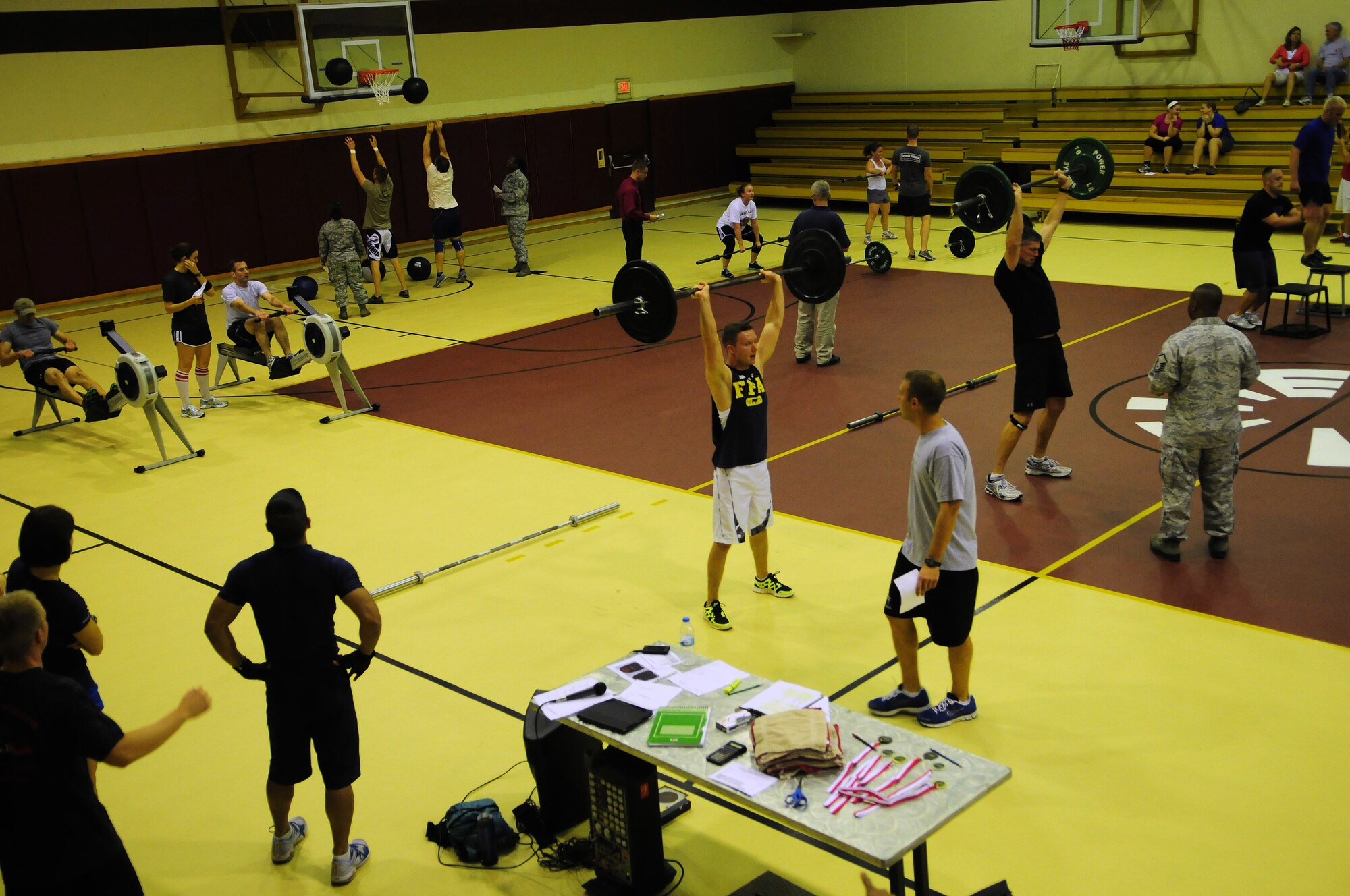 Members of Team Incirlik participate in the Lik Fit Challenge Nov. 16, 2012 at Incirlik Air Base, Turkey. Participants went through three five-minute rounds to earn points by completing exercises with a one-minute rest period after each round. (U.S. Air Force photo by Staff Sgt. Lana Mills/Released)