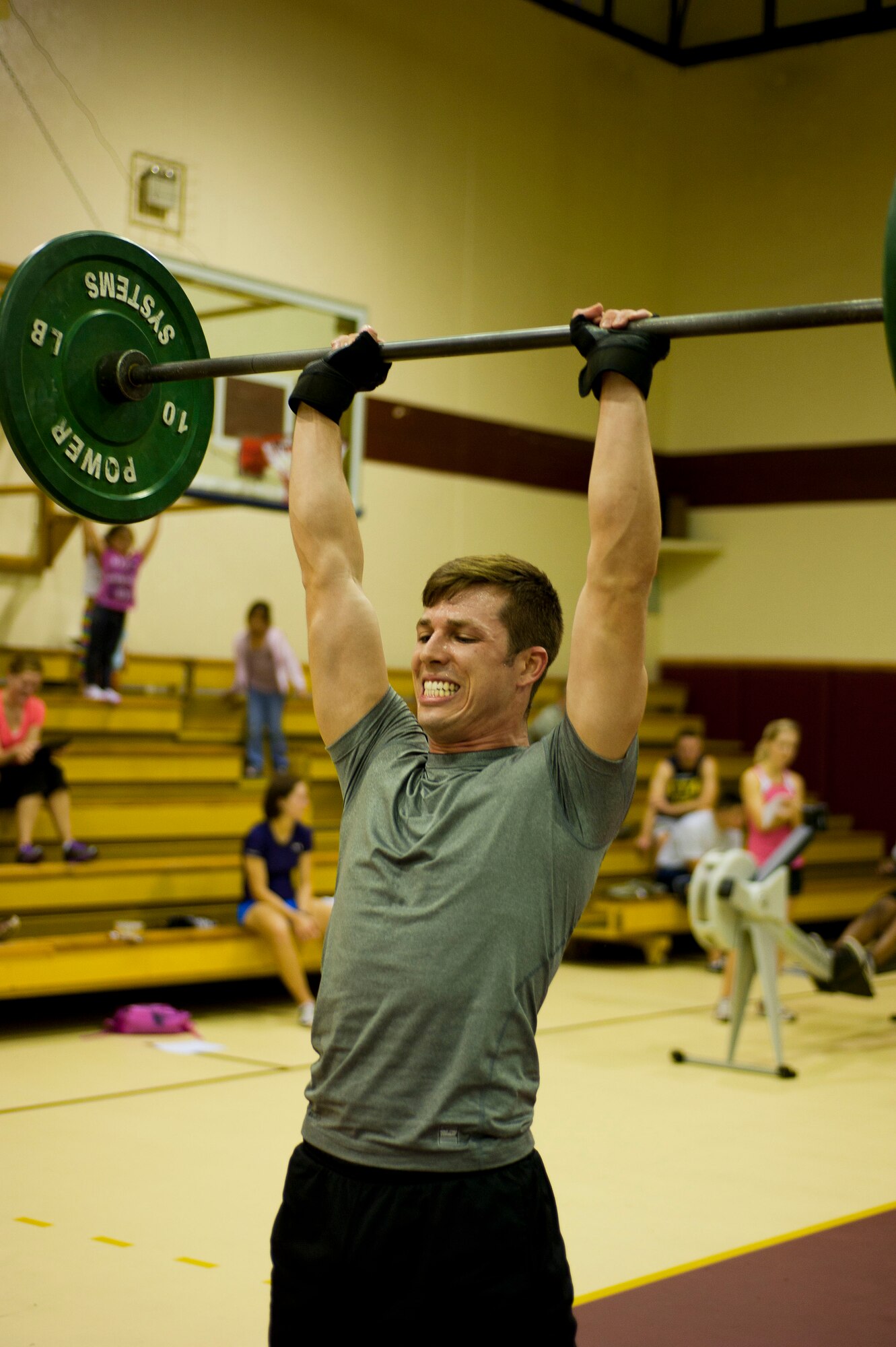 Jason Rimer, 39th Contracting Squadron,  takes part in the push presses portion of the Lik Fit Challenge Nov. 14, 2012, at Incirlik Air Base, Turkey. Several units across base participated in the challenge as an alternative physical training session. (U.S. Air Force photo by Senior Airman Clayton Lenhardt/Released)