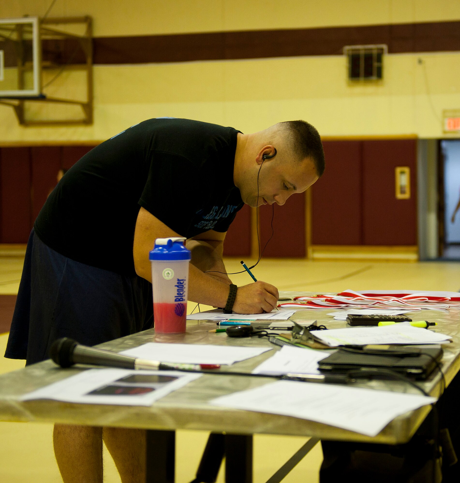 Peter Ising, American Forces Network Incirlik, signs up for the Lik Fit Challenge Nov. 15, 2012, at Incirlik Air Base, Turkey. The event was held as a way to introduce members of the base to high-intensity exercises. (U.S. Air Force Photo by Senior Airman Clayton Lenhardt/Released)