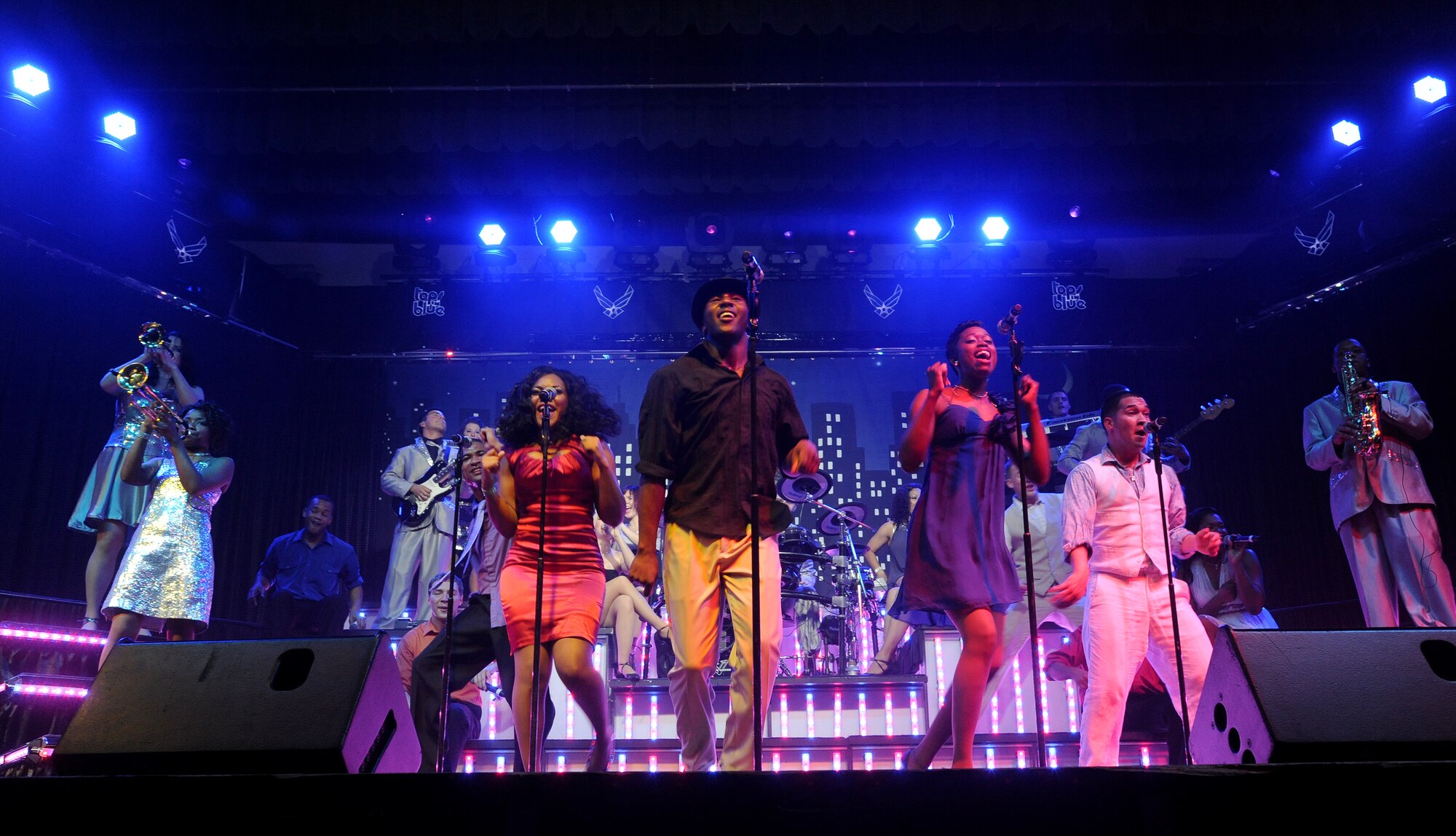 KADENA AIR BASE, Japan--Performers from Tops in Blue perform for a full audience at the Keystone Theater on Kadena Air Base, Japan, Nov. 16, 2012. This year’s Tops in Blue performance entitled “Listen” is being performed for service members throughout the United States as well as 20 countries worldwide. (U.S. Air Force photo/Staff Sgt. Laszlo Babocsi)