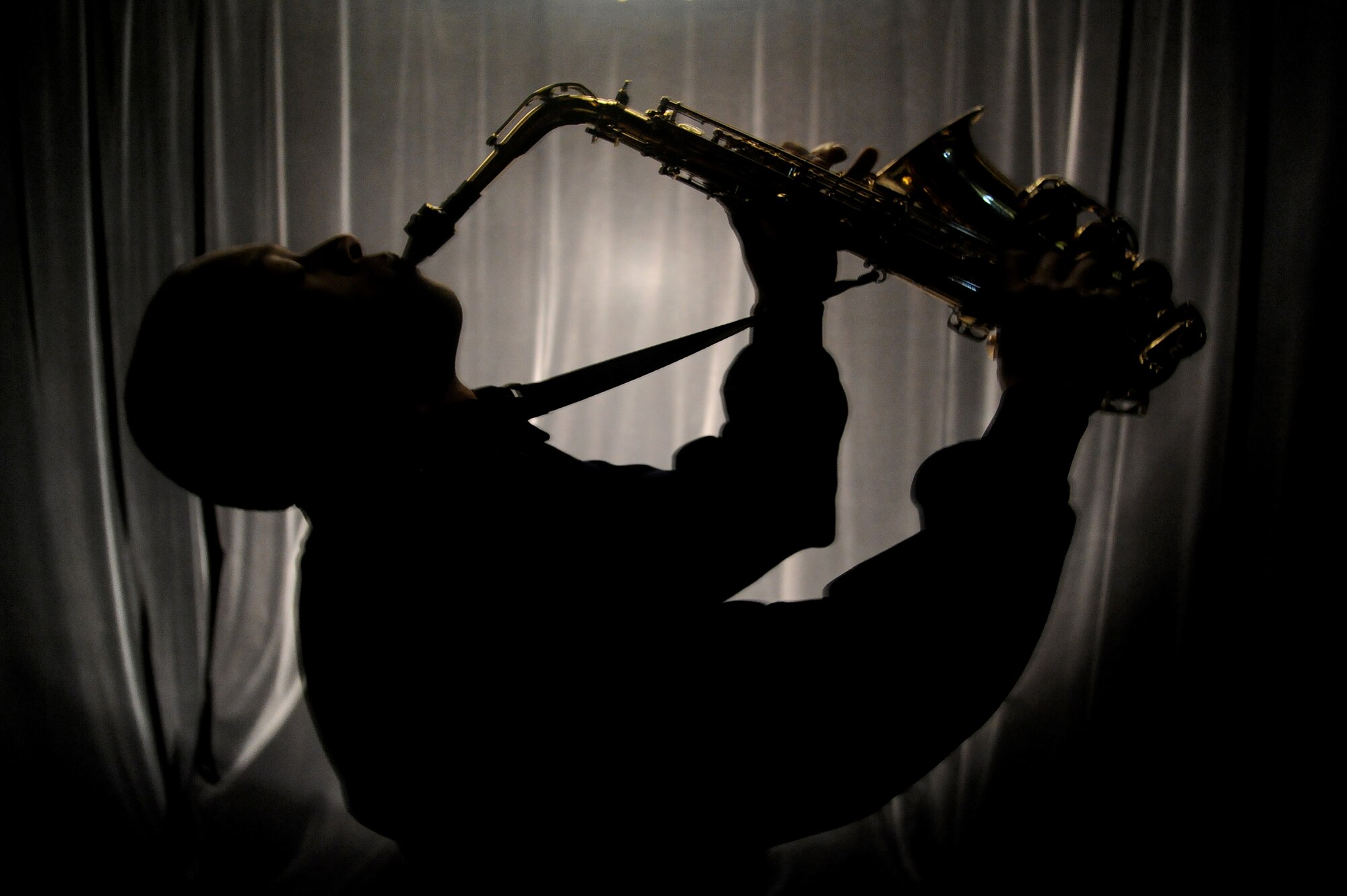 KADENA AIR BASE, Japan--Airman 1st Class Wynton Warren, alto saxophone with Tops in Blue, plays his saxophone during an interview on Kadena Air Base, Japan, Nov. 16, 2012. Warren is a part of the 18th Communications Squadron when he’s not touring with Tops in Blue performing for service members throughout the world (U.S. Air Force photo/Staff Sgt. Laszlo Babocsi)