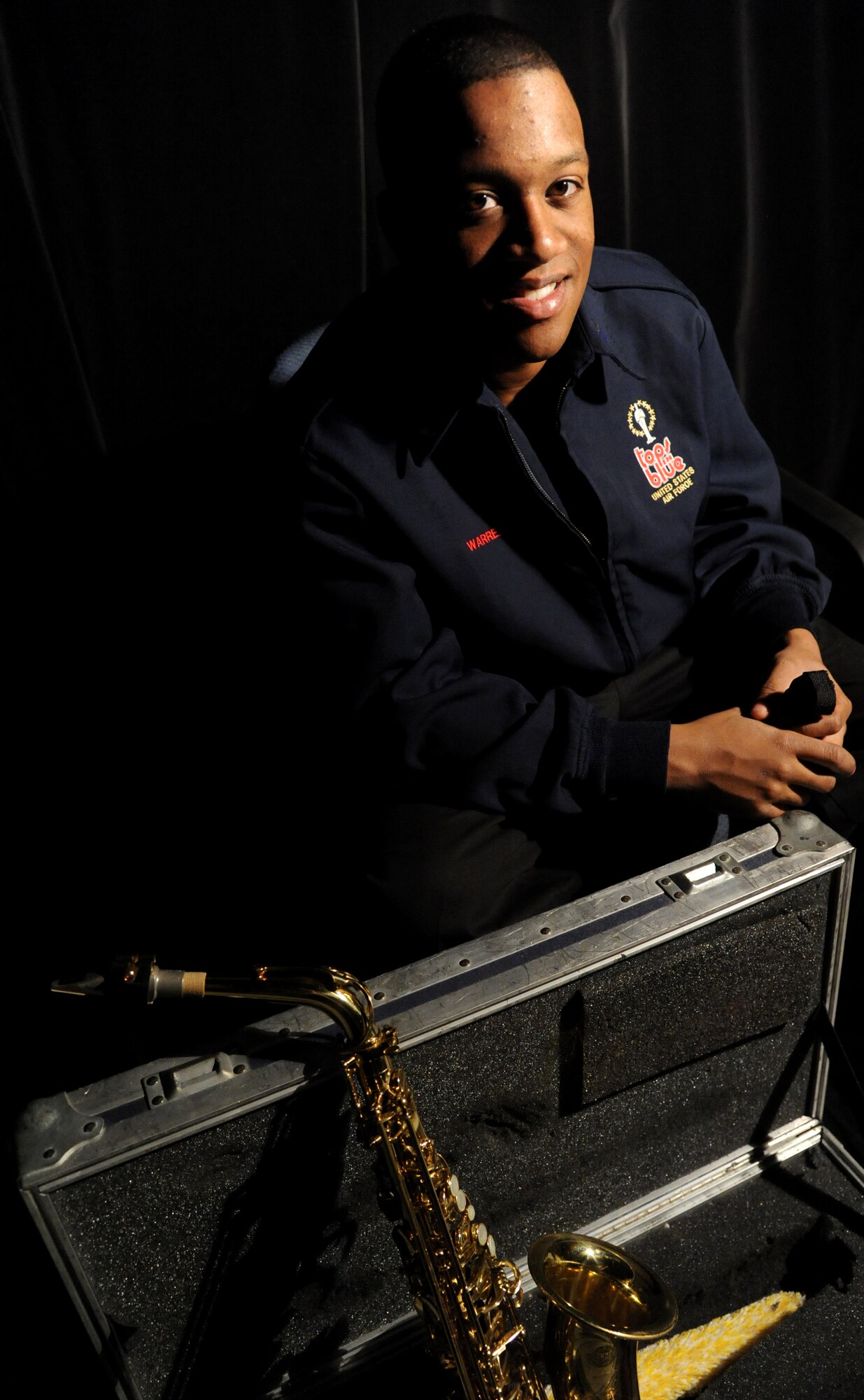 KADENA AIR BASE, Japan--Airman 1st Class Wynton Warren, alto saxophone with Tops in Blue, posses for a photo with his saxophone on Kadena Air Base, Japan, Nov. 16, 2012. Warren is a part of the 18th Communications Squadron when he’s not touring with Tops in Blue performing for service members throughout the world (U.S. Air Force photo/Staff Sgt. Laszlo Babocsi) 