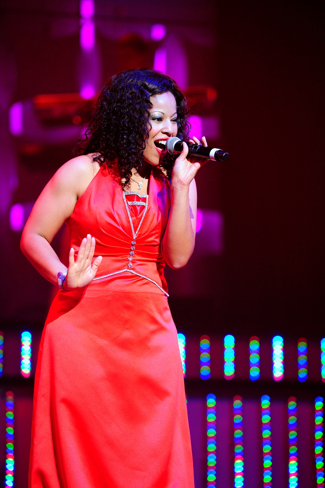 U.S. Air Force 1st Lt. Kandis Rich, Tops In Blue vocalist, sings for the Misawa Air Base community and Japanese citizens, Nov. 14, 2012, at the Misawa City Civic Center, Japan. Airmen wishing to apply and audition for Tops In Blue must do so by Dec. 14 2012 for the Tops In Blue 2013 tour. More information can be found at www.topsinblue.com. (U.S. Air Force photo by Staff Sgt. Jess Lockoski)