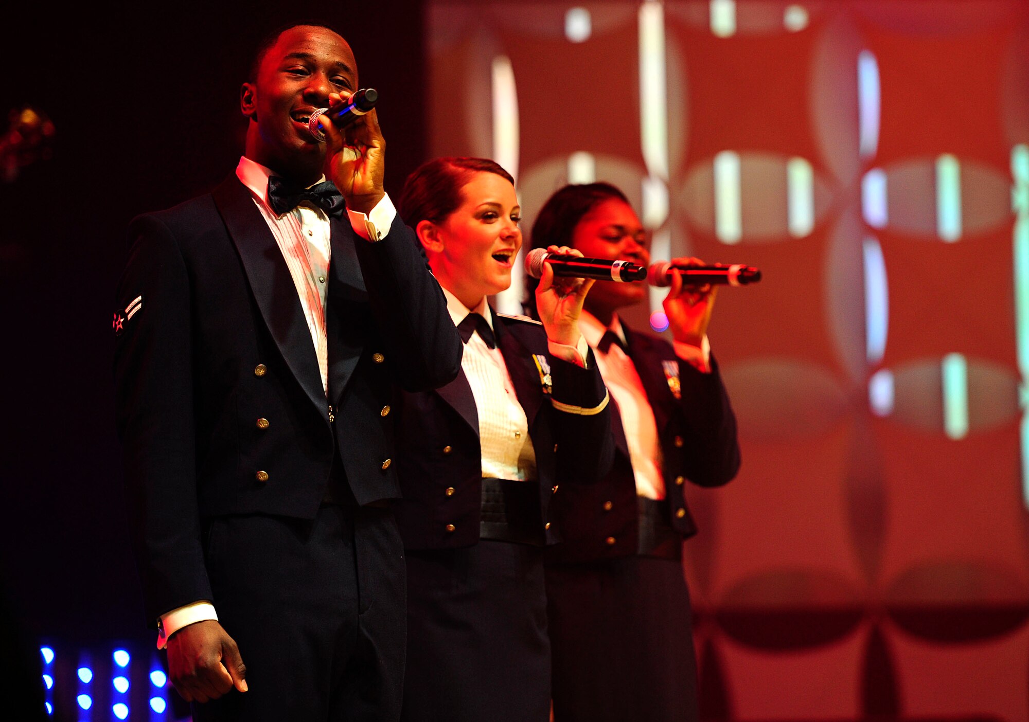 Airmen from Tops In Blue, the Air Force’s premiere entertainment showcase, sing a patriotic tune for the Misawa Air Base community and Japanese citizens, Nov. 14, 2012, at the Misawa City Civic Center, Japan. Airmen wishing to apply and audition for Tops In Blue must do so by Dec. 14 2012 for the Tops In Blue 2013 tour. More information can be found at www.topsinblue.com.  (U.S. Air Force photo by Staff Sgt. Jess Lockoski)