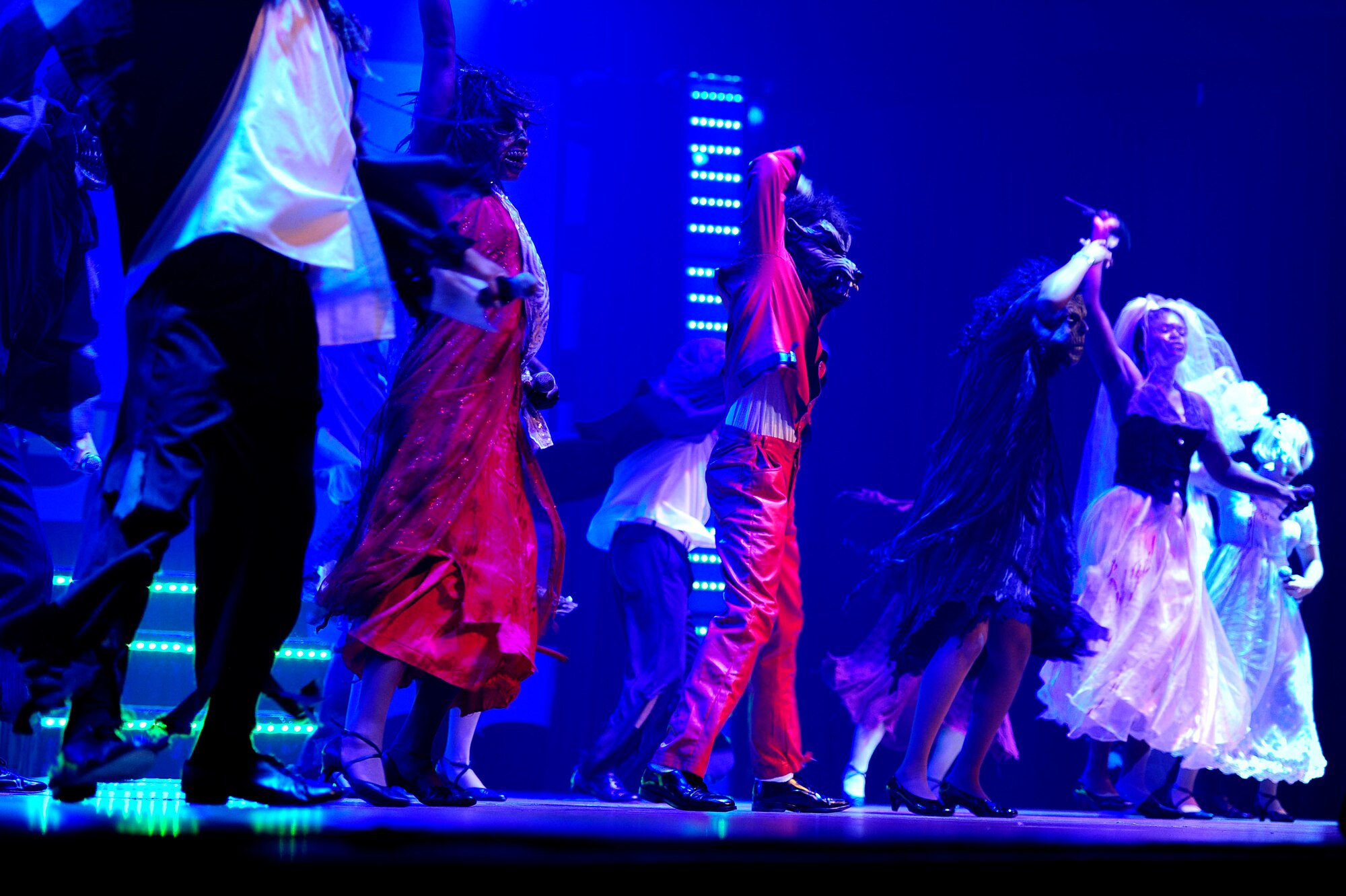 Airmen from Tops in Blue, the Air Force’s premiere entertainment, dance to ‘Thriller’ by famous pop artist, Michael Jackson, Nov. 14, 2012, at the Misawa City Civic Center, Japan. Airmen from Tops In Blue audition and earn spots on the team, providing entertainment throughout the year for servicemembers and their families stationed worldwide. (U.S. Air Force photo by Staff Sgt. Jess Lockoski)