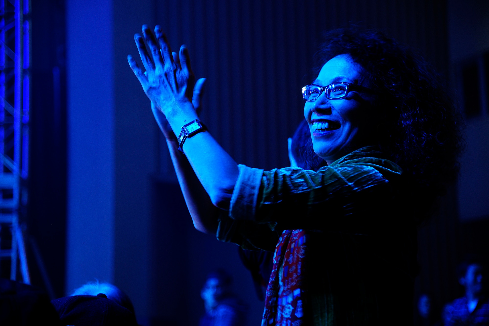 A Japanese citizen provides a standing ovation for Tops In Blue, the Air Force’s premiere entertainment showcase, Nov. 14, 2012, at the Misawa City Civic Center, Japan. Tops in Blue, the Air Force’s premiere entertainment showcase comprised of more than 35 Airmen, provided entertainment for more than 800 Misawa Air Base residents and Japanese citizens. (U.S. Air Force photo by Staff Sgt. Jess Lockoski)