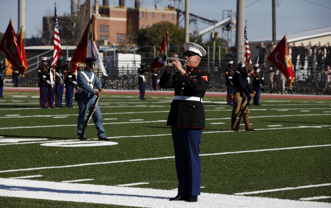 Lcpl. Michael J. Frick, bugler for 2nd Marine Division Band, plays Taps for the Joint Daytime Ceremony aboard Marine Corps Base Camp Lejeune Nov. 2. Taps was played in honor of fallen Marines from wars since the Marine Corps’ establishment in 1775.