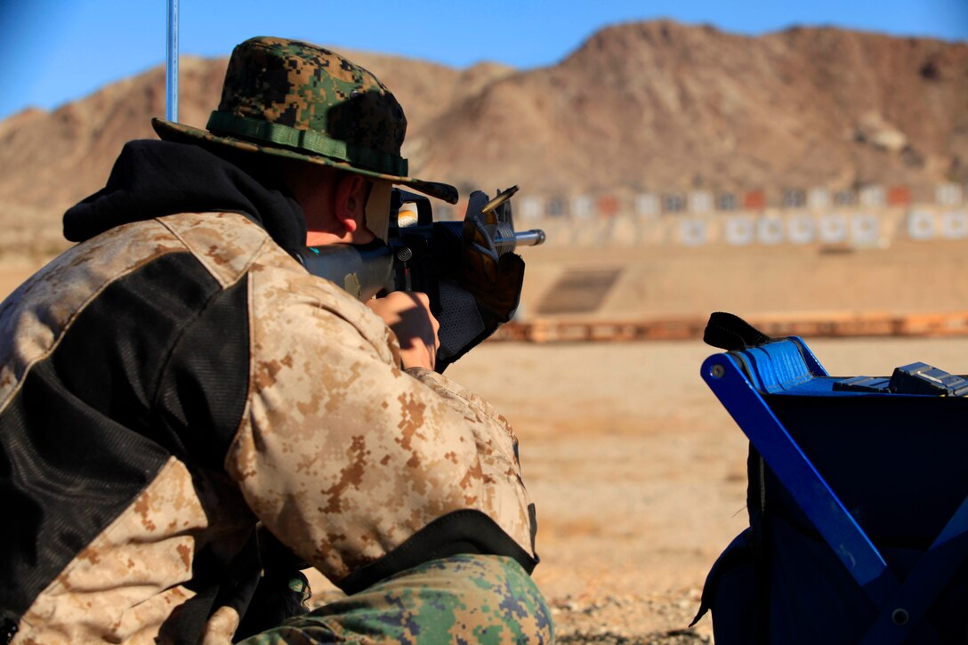 Sgt. Wayne S. Gallagher, a school range instructor for 3rd Battalion 7th Marine Regiment, also a member of the shooting team here, fires from the 200-yard line during the National Rifle Association Match at the known-distance range here Nov. 17.