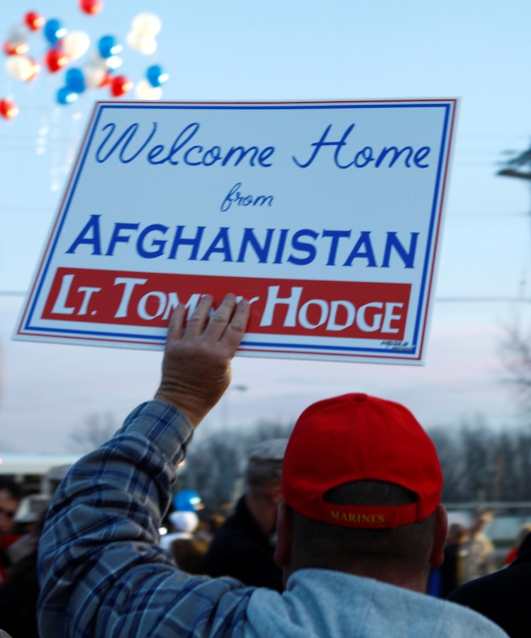 Friends and family welcome back the Marines of Company E, 4th Tank Battalion, 4th Marine Division, Nov. 15, 2012, at Fort Knox, Ky., after the Marines endured a six-month deployment to Afghanistan.  The unit cleared routes of roadside bombs and also helped develop an Afghan National Army route clearing company during their deployment. (U.S. Marine Corps Photo by Cpl. Nana Dannsa-Appiah/Released)