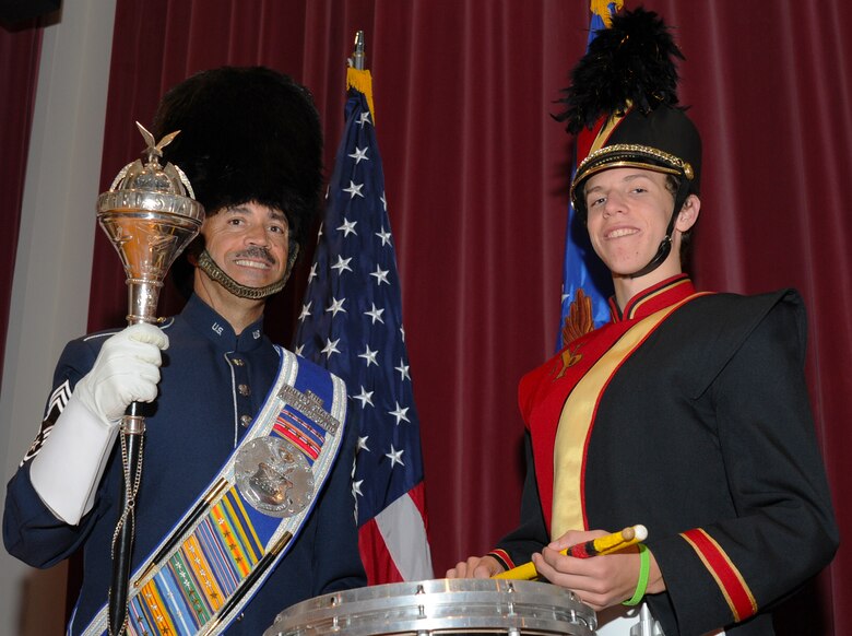 Chief Master Sgt. Ed Teleky, U.S. Air Force Band drum major, and his son Tony, drum line captain at North Point High School in Waldorf, Md., are slated to appear at the 86th Annual Macy's Thanksgiving Day Parade in New York on Nov. 22.  This will be Tony's second appearance with the Macy's All American Marching Band, and the first appearance for both Chief Teleky and the Air Force Band. (U.S. Air Force photo/Staff Sgt. Torey Griffith)