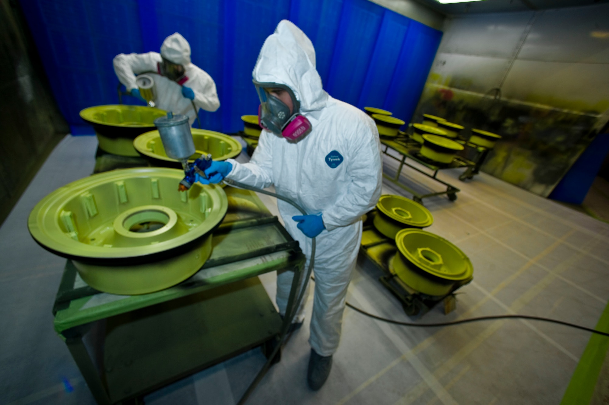 Senior Airman Daniel Cooper and Airman 1st Class Alekos Escalera, corrosion control specialists from the 1st Special Operations Equipment Maintenance Squadron, spray a protective organic coating over C-130 main landing gear wheels for routine maintenance. The duo are taking extra care to ensure proper corrosion treatment procedures are followed in preparation for the upcoming consolidated unit inspection happening early next year. 

(DoD photo by Air Force Tech. Sgt. Vanessa Valentine) RELEASED

