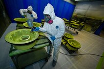Senior Airman Daniel Cooper and Airman 1st Class Alekos Escalera, corrosion control specialists from the 1st Special Operations Equipment Maintenance Squadron, spray a protective organic coating over C-130 main landing gear wheels for routine maintenance. The duo are taking extra care to ensure proper corrosion treatment procedures are followed in preparation for the upcoming consolidated unit inspection happening early next year. 

(DoD photo by Air Force Tech. Sgt. Vanessa Valentine) RELEASED

