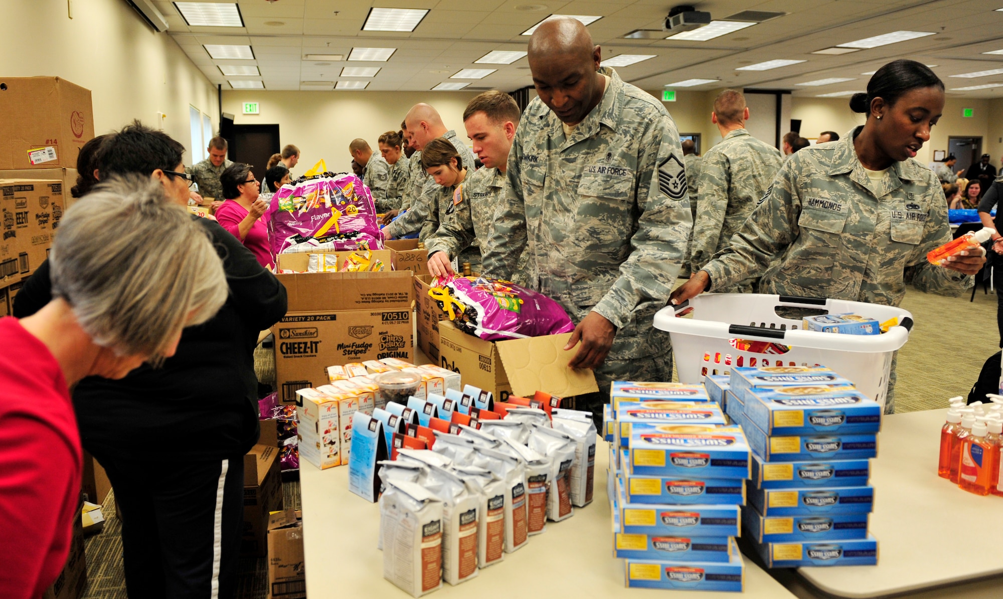 BUCKLEY AIR FORCE BASE, Colo. – Members from Buckley and the Smokey Hill Vineyard Food Bank joined together to bring joy and wellness to military families Nov. 19, 2012, at the base chapel. Thanksgiving is near, so as a result, this food drive gave military families stability during the holidays. (U.S. Air Force photo by Airman 1st Class Darryl Bolden Jr.)