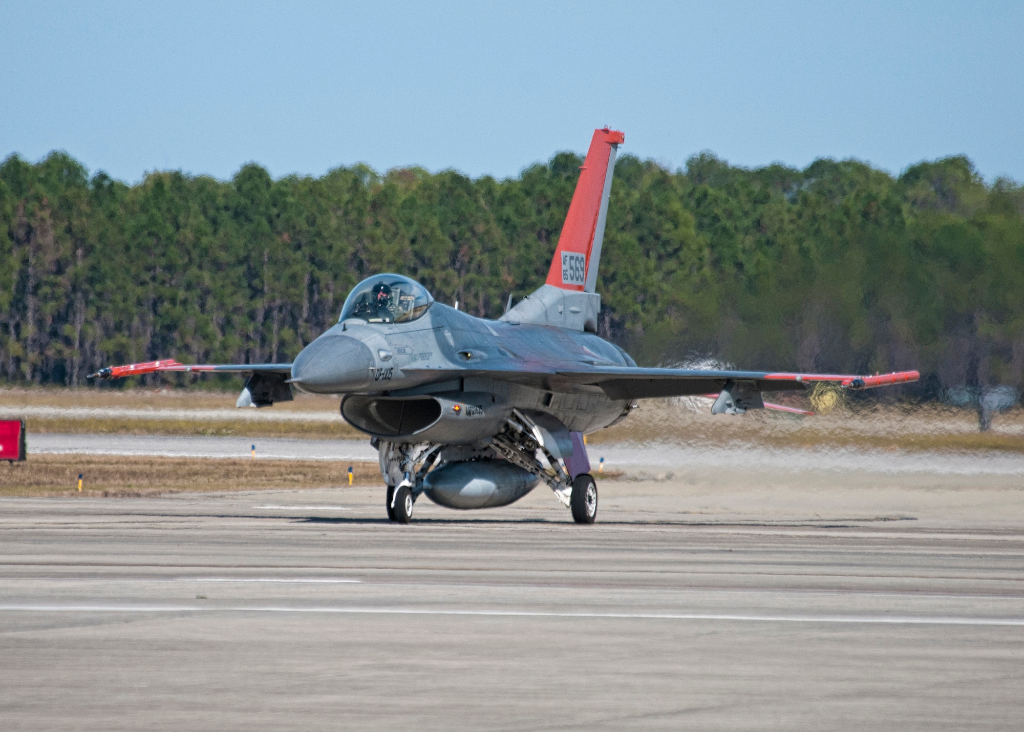 The first QF-16 arrives at Tyndall escorted by a QF-4 Nov. 19. The QF-16 will undergo developmental testing by Boeing and eventually become part of the 53rd Weapons Evaluation Group. The QF-16 is a supersonic reusable full-scale aerial target drone modified from an F-16 Fighting Falcon. At this time, the group uses QF-4s, made from 1960s F-4 Phantom, to conduct their full-scale aerial target missions. The targets allow the Air Force and allied nations to have a realistic understanding of what they could face on the battlefield. (U.S. Air Force photo by Chris Cokeing)