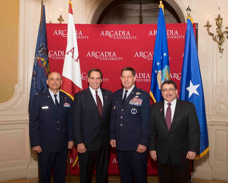 (From left to right) Lt. Col. Vincent Kirkner, 87th Medical Group; Carl (Tobey) Oxholm, III, Arcadia University president; Brig. Gen. John Horner, Air Force Recruiting Service commander; and Michael Dryer, Medical Science and Community Health chair, pose for  a photo following the signing of an "Educational Affiliation Agreement" November 5.  The agreement between Arcadia University and Joint Base McGuire-Dix Lakhurst, N.J., will offer students an opportunity to pull clinical rotations at the Air Force base's Family Health Clinic. The program was initiated by the 360th Recruiting Group as a way to give students some hands-on experience and expose them to the AIr Force as a career opportunity. (photo courtesy of Arcadia University)