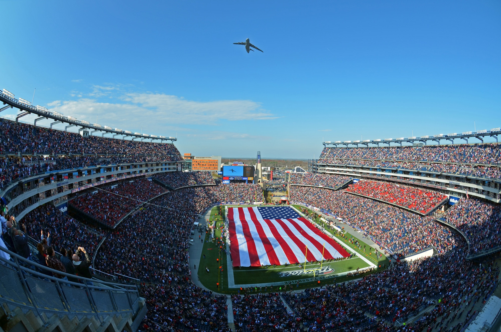 A C-5 Galaxy flies over Gillette Stadium, Foxboro, Mass., Nov. 11, 2012. The fly over was prior to the Patriots kick off with an estimated crowd of more than 68,000. The aircraft is from the "the Patriot Wing" at Westover Air Reserve Base, Mass. (U.S. Air Force photo/Senior Airman Kelly Galloway)