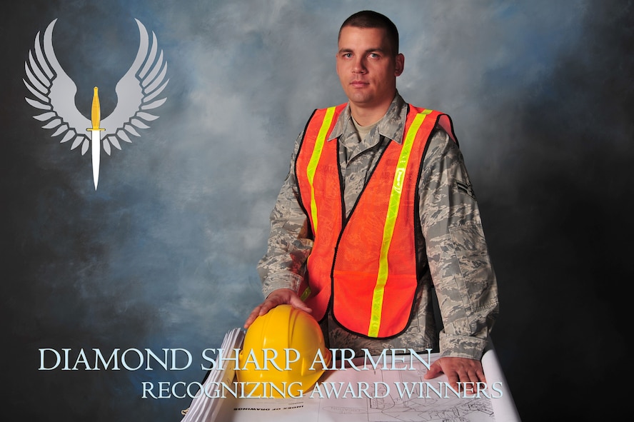 U.S. Air Force Airman 1st Class Matthew Marshall, 27th Special Operations Contracting Squadron contract specialist, poses for his Diamond Sharp award studio portrait at Cannon Air Force Base, N.M., Nov. 20, 2012. Diamond Sharp is a monthly program where Airmen are recognized by wing leadership and first sergeants for their hard work and achievements. (U.S. Air Force illustration/Senior Airman Alexxis Pons Abascal)