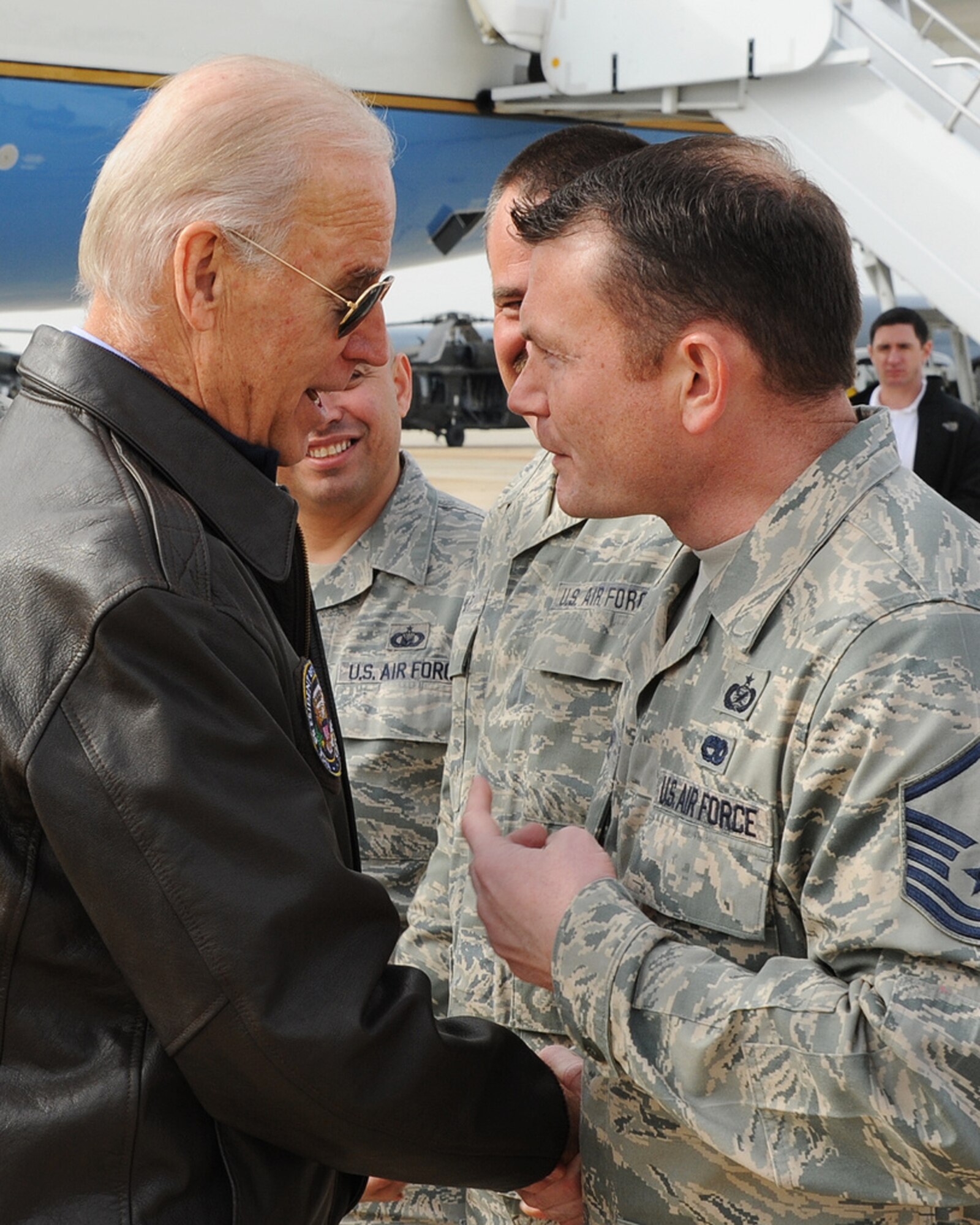 Master Sgt. Shawn Jones, 514th Air Mobility Wing public affairs, talks with Vice President Joe Biden on the flight line here Nov. 17. Jones  joked that since they last met in 2009, he had been promoted twice while Biden hadn't been promoted at all. Biden returned the quip by saying the next time they cross paths, maybe Jones would give Biden a little help with his next promotion. The Vice President visited with several service members at the base before boarding a helicopter to tour the areas which were devastated by Hurricane Sandy. (U.S. Air Force photo by Airman Sean Crowe)
