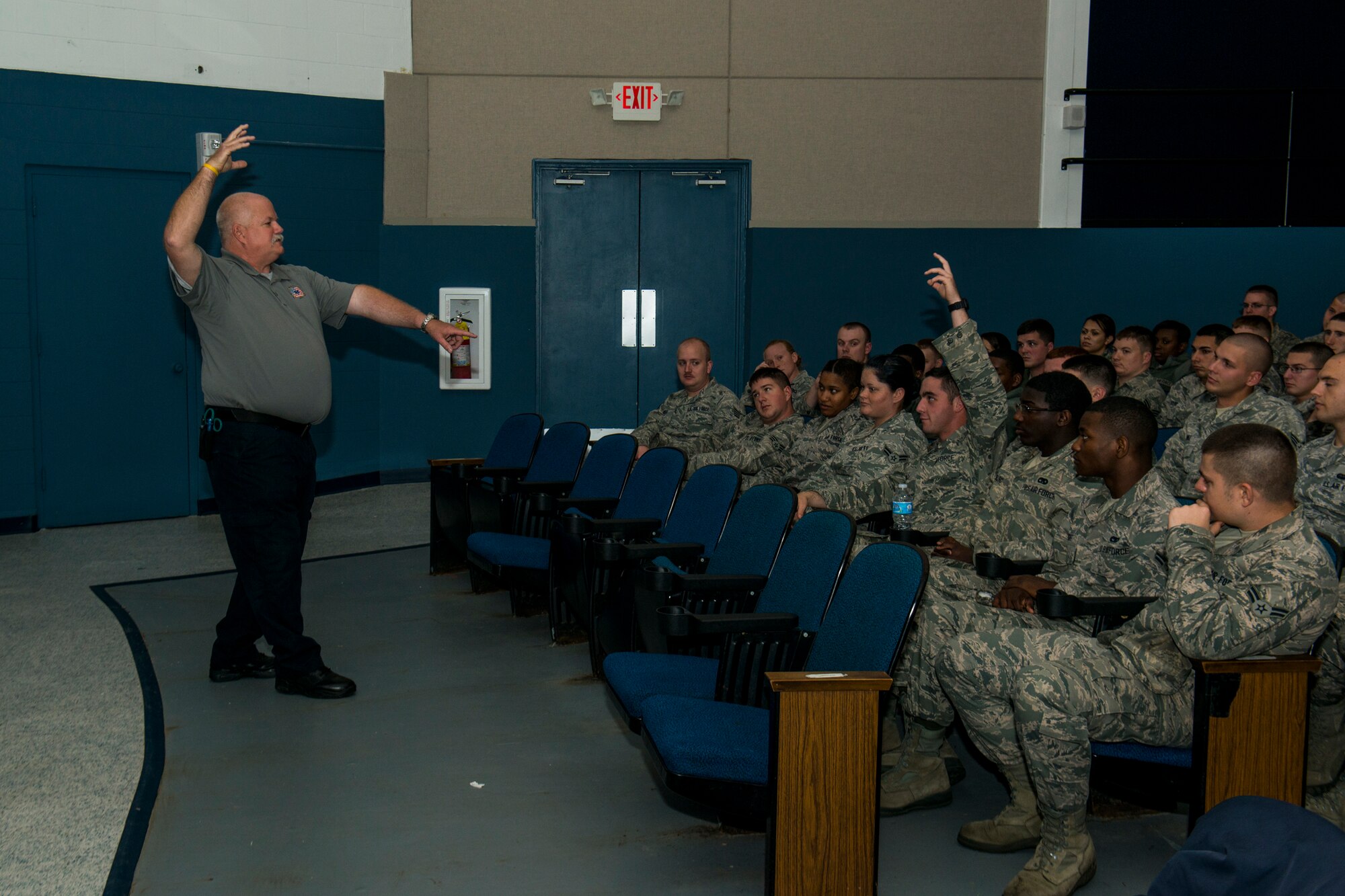 Greg McCarty, Street Smart presenter and retired Tampa Fire Rescue lieutenant, chooses a volunteer during a Street Smart presentation Nov. 16, 2012, at Moody Air Force Base, Ga. Street Smart is a safety program designed to emphasize the dangers of making poor decisions while driving a vehicle. (U.S. Air Force photo by Staff Sgt. Jamal D. Sutter/Released) 