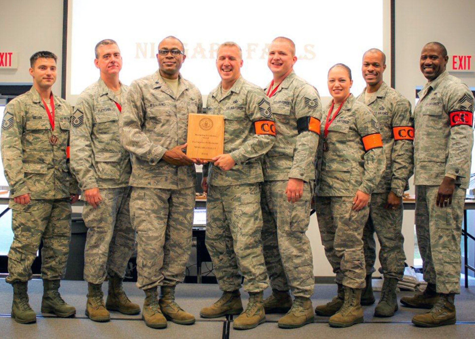 The 914th Airlift Wing recruiting office is presented the Superior Achievement Award at the Air Force Reserve Recruiting awards banquet October 25 in Savannah, Ga.  Team Niagara earned this award in recognition for achieving more than 110% of their assigned Fiscal Year 2012 recruiting goal.  Pictured left to right:  Master Sgt. Jacob Miller, 914 AW line recruiter; Master Sgt. Matthew Fletcher, 914 AW line recruiter; Lt. Col. Jerome Williams, Northern Recruiting Squadron commander; Senior Master Sgt. Robert Denehy, 914 AW senior recruiter; Tech. Sgt. Michael Mommertz, 914 AW line recruiter; Tech. Sgt. Ariane Fisher, 914 AW line recruiter; Chief Master Sgt. Antony Rice, incoming Northern Recruiting Squadron superintendent; Chief Master Sgt. Rondey Bullock, Northern Recruiting Squadron superintendent.  (Courtesy photo)