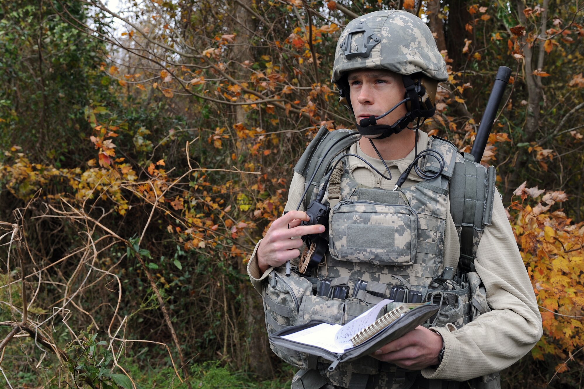 U.S. Air Force 1st Lt. Brad DeWees, 14th Air Support Operations Squadron air liaison officer, from Pope Army Air Field, N.C., communicates with aircrew during a field training exercise at Creswell, N.C., Nov. 15, 2012. Prior to the field training exercise, the trainees must pass through five simulated missions and a JTAC qualification course exam. (U.S. Air Force photo/Airman 1st Class John Nieves Camacho/Released)