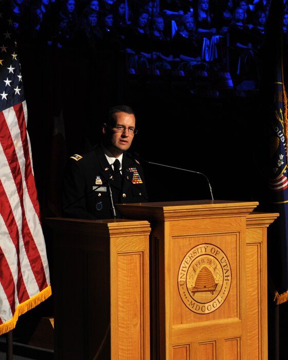 Col. Hank McIntire, the Utah National Guard's state public affairs officer, performs as the Master of Ceremonies during the 57th annual Veterans Day concert at the University of Utah's Jon M. Huntsman Center, on Nov. 10. (U.S. Air Force photo by Senior Airman Lillian Harnden)(RELEASED)