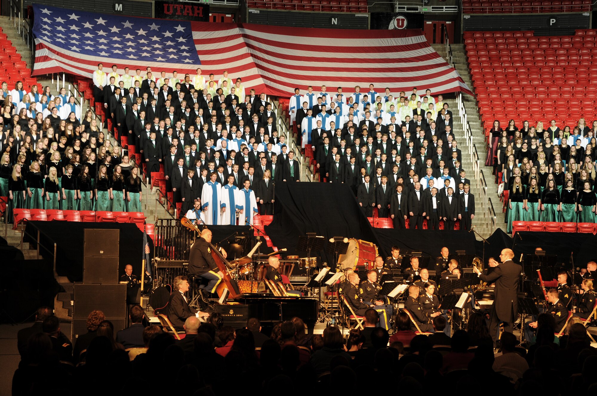 The Utah National Guard's 23rd Army Band and a 600-voice combined choir from Granite School District high schools performs at the Utah National Guard's 57th annual Veterans Day concert at the University of Utah's Jon M. Huntsman Center, Nov. 10. (U.S. Air Force photo by Senior Airman Lillian Harnden)(RELEASED)