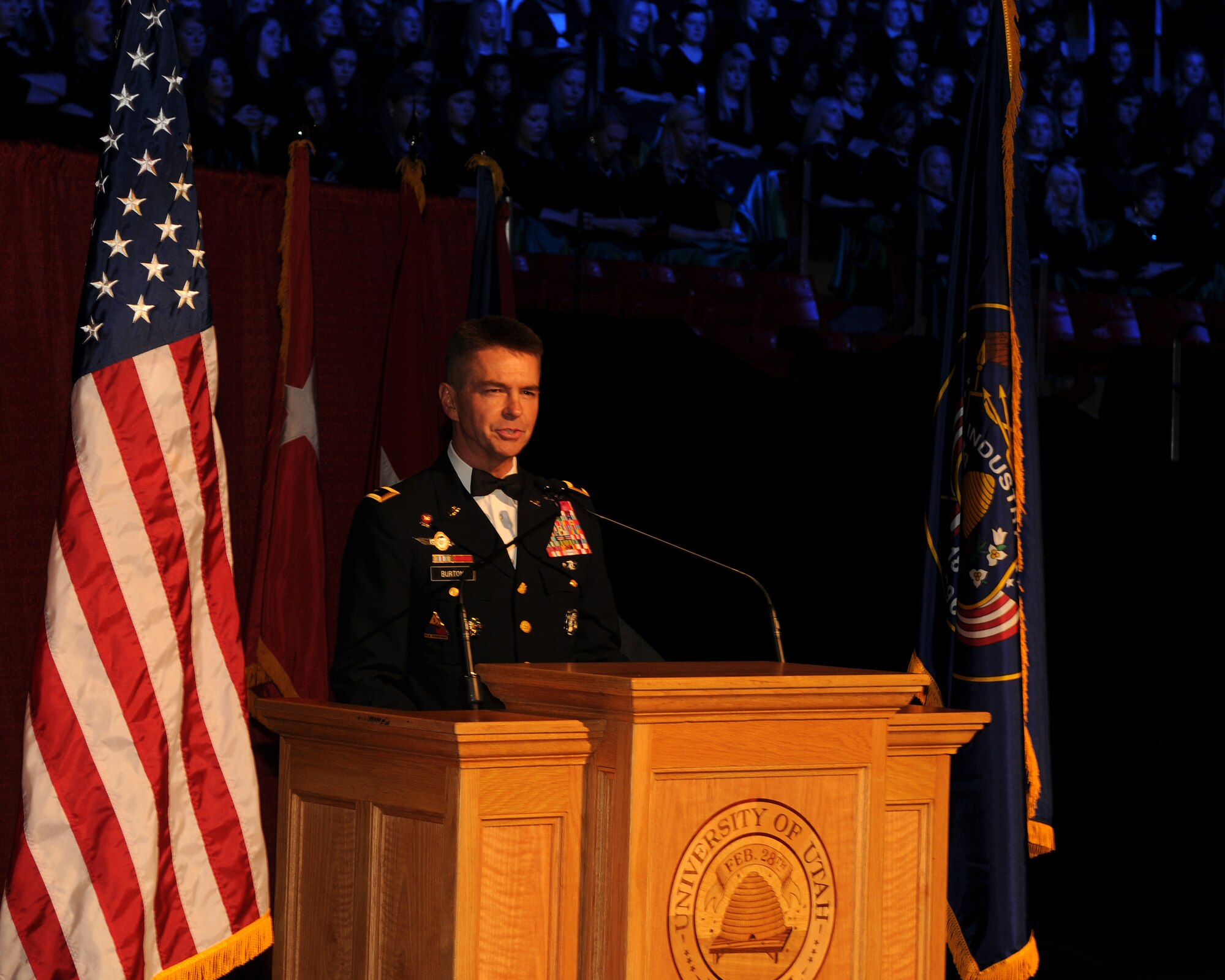 Guest speaker Maj. Gen. Jefferson Burton, the Adjutant General of the Utah National Guard, addressed the audience during the 57th annual Veterans Day concert at the University of Utah's Jon M. Huntsman Center, on Nov. 10. Burton dedicated the night's performance to veterans who served in the past, and to veterans who are currently in harm's way. (U.S. Air Force photo by Senior Airman Lillian Harnden)(RELEASED)