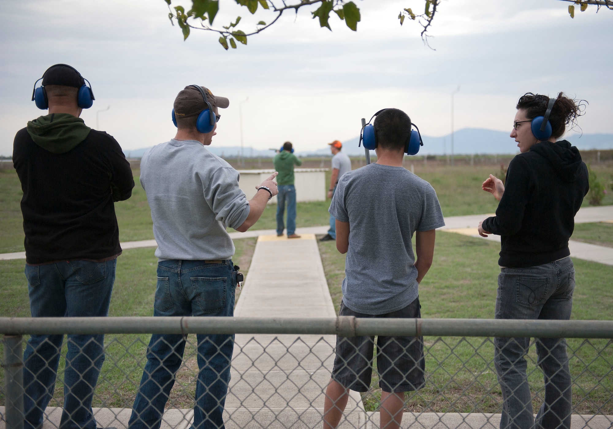 Participants await their chance to win a turkey during the Outdoor Recreation Turkey Shoot Nov. 18, 2012 at Incirlik Air Base, Turkey. There were five competitors in a round, and the winner of each round received a gift card for a turkey from the commissary. (U.S. Air Force photo by Senior Airman Clayton Lenhardt/Released)