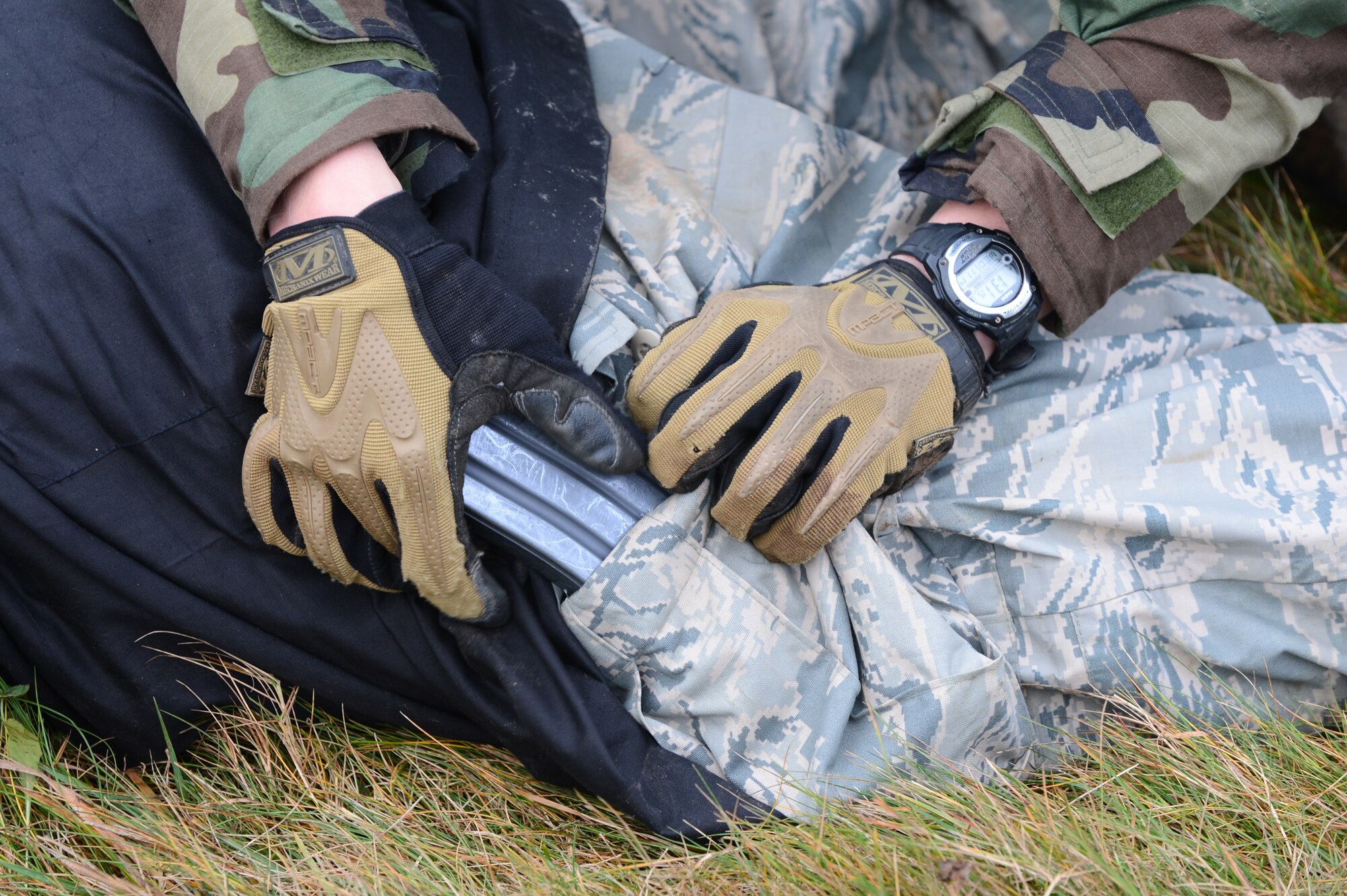 SPANGDAHLEM AIR BASE, Germany – An Airman assigned to the 606th Air Control Squadron searches an enemy combatant for weapons during combat readiness training Nov. 14, 2012. The various field exercise scenarios prepare Airmen for a broad range of likely situations ranging from treating wounded comrades to combat communications defense. (U.S. Air Force photo by Airman 1st Class Dillon Davis/Released)