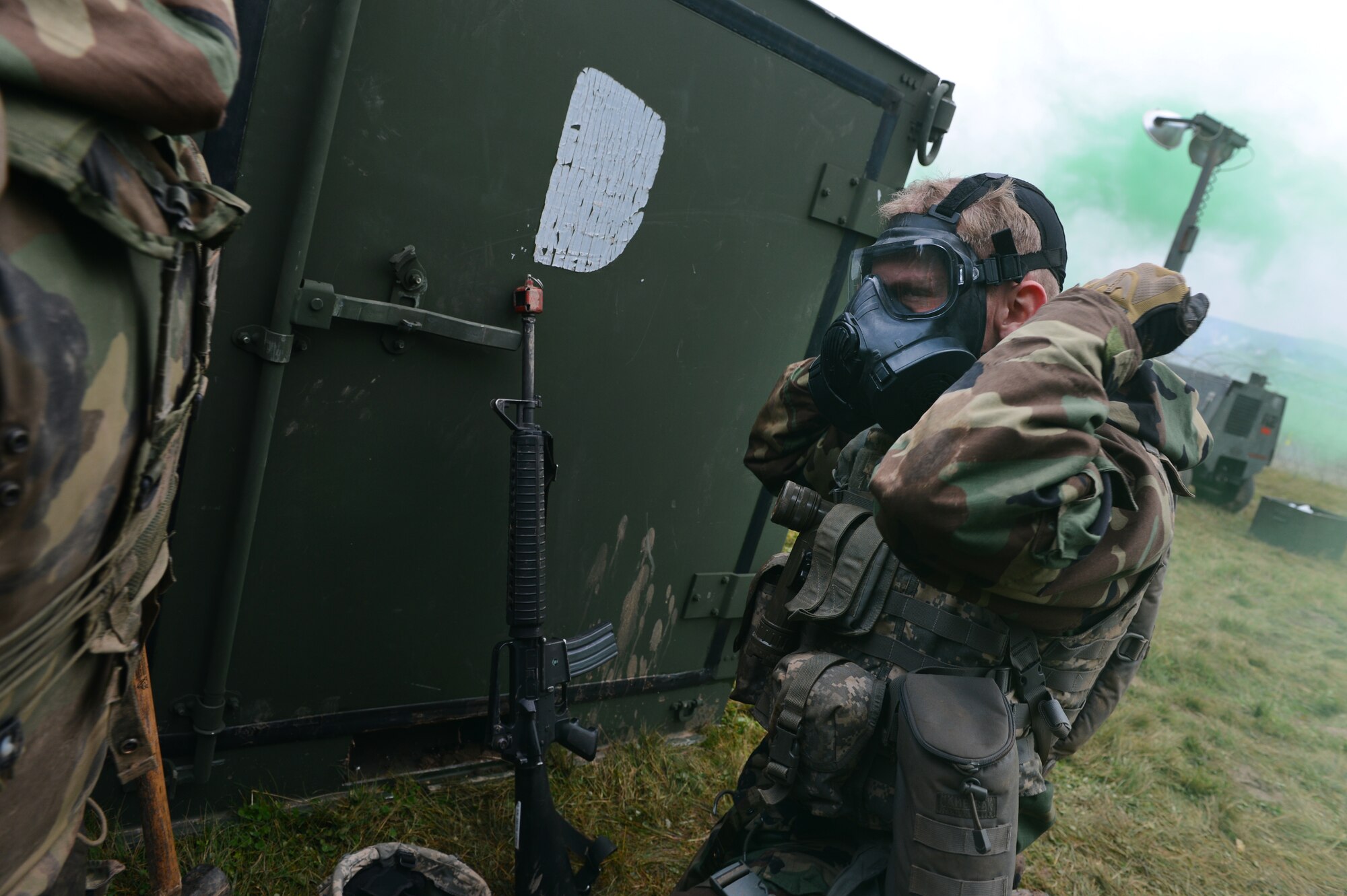 SPANGDAHLEM AIR BASE, Germany – U.S. Air Force 2nd Lt. John Francis, 606th Air Control Squadron executive officer from Colorado Springs, Colo., puts on his M50 gas mask during the squadron's combat readiness training Nov. 14, 2012. The Airmen are required to complete a three-week combat readiness training course before they are eligible to deploy. (U.S. Air Force photo by Airman 1st Class Dillon Davis/Released)