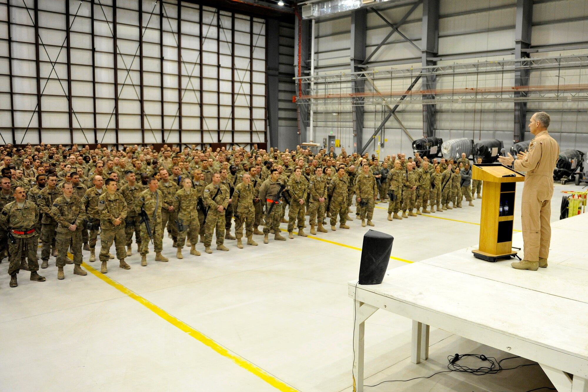 U.S. Air Force Gen. Mike Hostage, commander of Air Combat Command, speaks at an “all-call” at Bagram Airfield, Afghanistan, Nov. 13, 2012. Airmen of the 455th Air Expeditionary Wing had an opportunity to ask the ACC commander questions in an open venue and listen to his insight on current military operations.  Some of the topics highlighted were the projected drawdown of U.S. forces in the region and talks of a reform in the current military retirement program.  (U.S. Air Force photo/Senior Airman Chris Willis/Released)