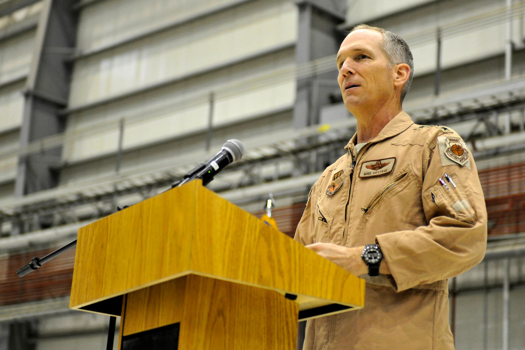 U.S. Air Force Gen. Mike Hostage, commander of Air Combat Command, speaks at an “all-call” at Bagram Airfield, Afghanistan, Nov. 13, 2012. Hostage visited BAF to emphasize the critical nature of the Airmen’s mission in Afghanistan and took questions from the audience on current matters affecting the Air Force.  (U.S. Air Force photo/Senior Airman Chris Willis/Released)