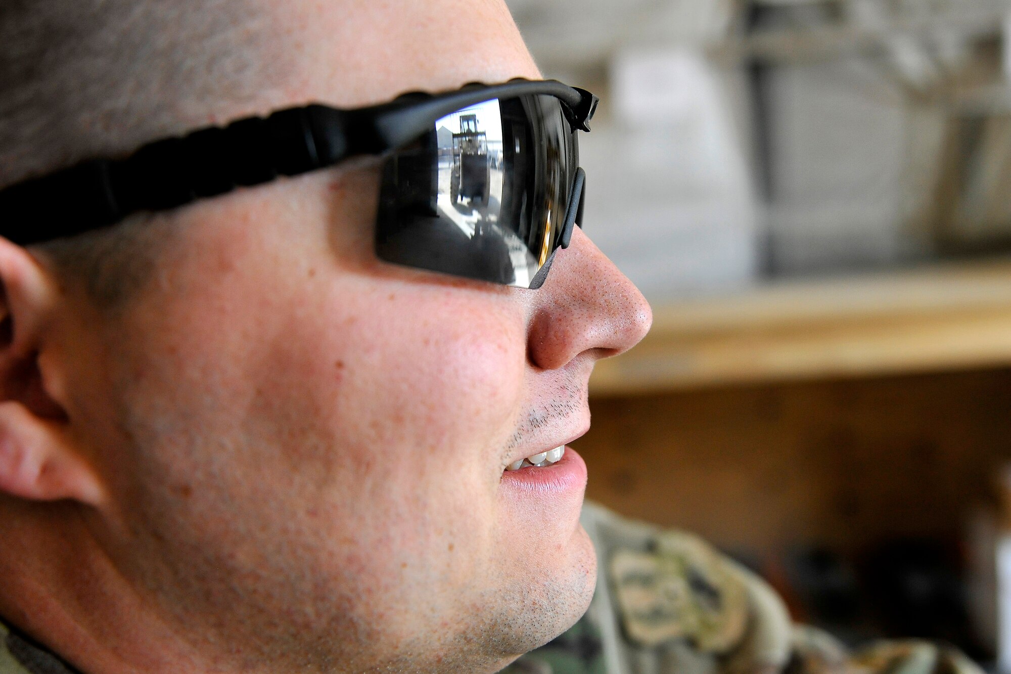 Senior Airman Zachary Reischman, a member of the 455th Expeditionary Knowledge Operations Management office, guides the lowering and receiving of a mail pallet from a fork lift at Bagram Airfield, Afghanistan, Nov. 15, 2012.  Members of the KOM office dedicate themselves, day-in and day-out, to provide an appreciated service to 455th Air Expeditionary Wing by keeping the mail flowing. (U.S. Air Force photo/Senior Airman Chris Willis)