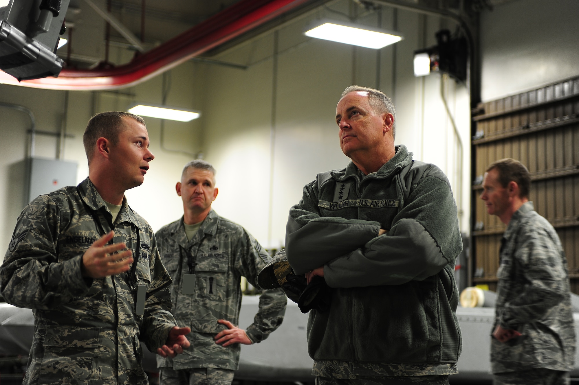 MINOT AIR FORCE BASE, N.D. -- Air Force Chief of Staff Gen. Mark A. Welsh III talks with Airmen from Team Minot during a tour of the Weapons Storage Area here, Nov. 21. The tour was part of Welsh's first visit to Minot since becoming the chief of staff. (U.S. Air Force photo/Airman 1st Class Kristoffer Kaubisch)