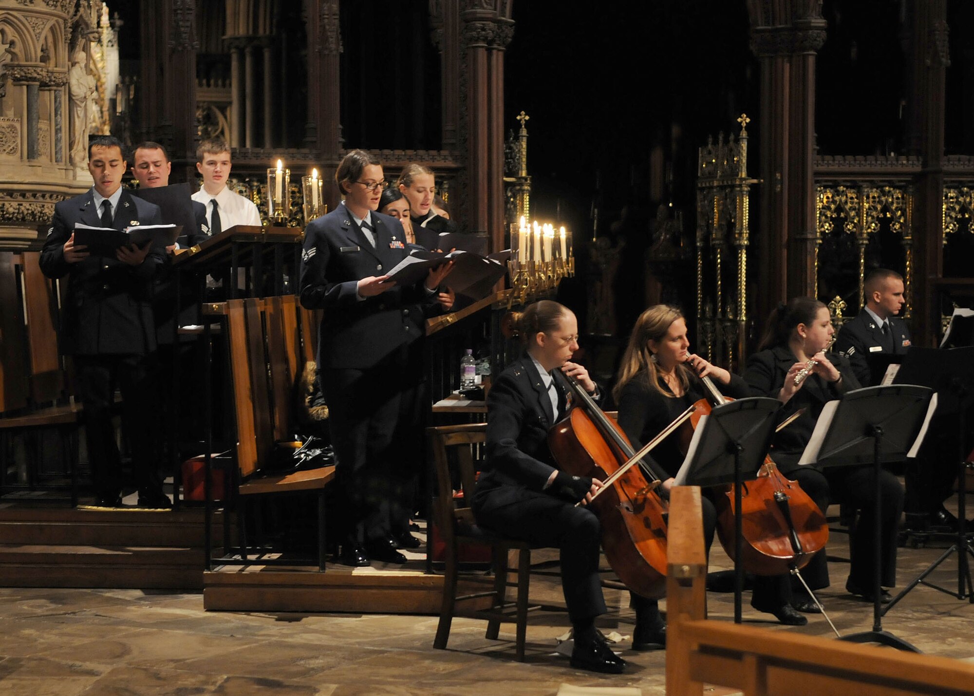 ELY, England – The RAF Mildenhall and RAF Lakenheath combined choir sings during a service on the eve of Thanksgiving Nov. 21, 2012, at Ely Cathedral. This service of thanks is conducted every year for American service members, their families and other employees of RAF Mildenhall and RAF Lakenheath.  (U.S. Air Force photo by Staff Sgt. Tabitha M. Lee/Released)