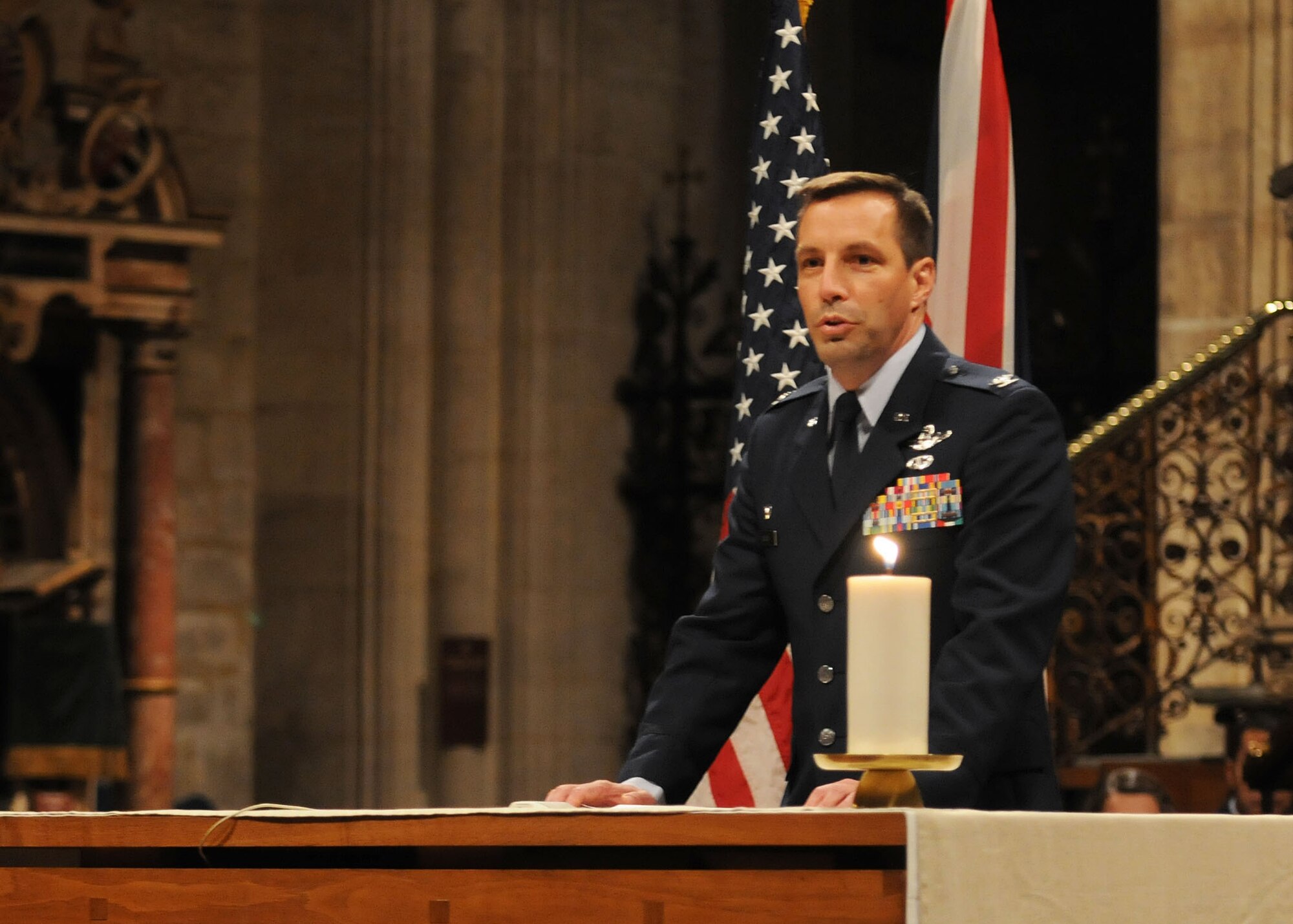 ELY, England – Col. Christopher Kulas, 100th Air Refueling Wing commander, greets the congregation during the Thanksgiving service Nov. 21, 2012, at Ely Cathedral. The 26th annual Thanksgiving service gave U.S. service members in England an opportunity to enjoy a holiday service at one of the cathedrals in the local area. (U.S. Air Force photo by Staff Sgt. Tabitha M. Lee/Released)