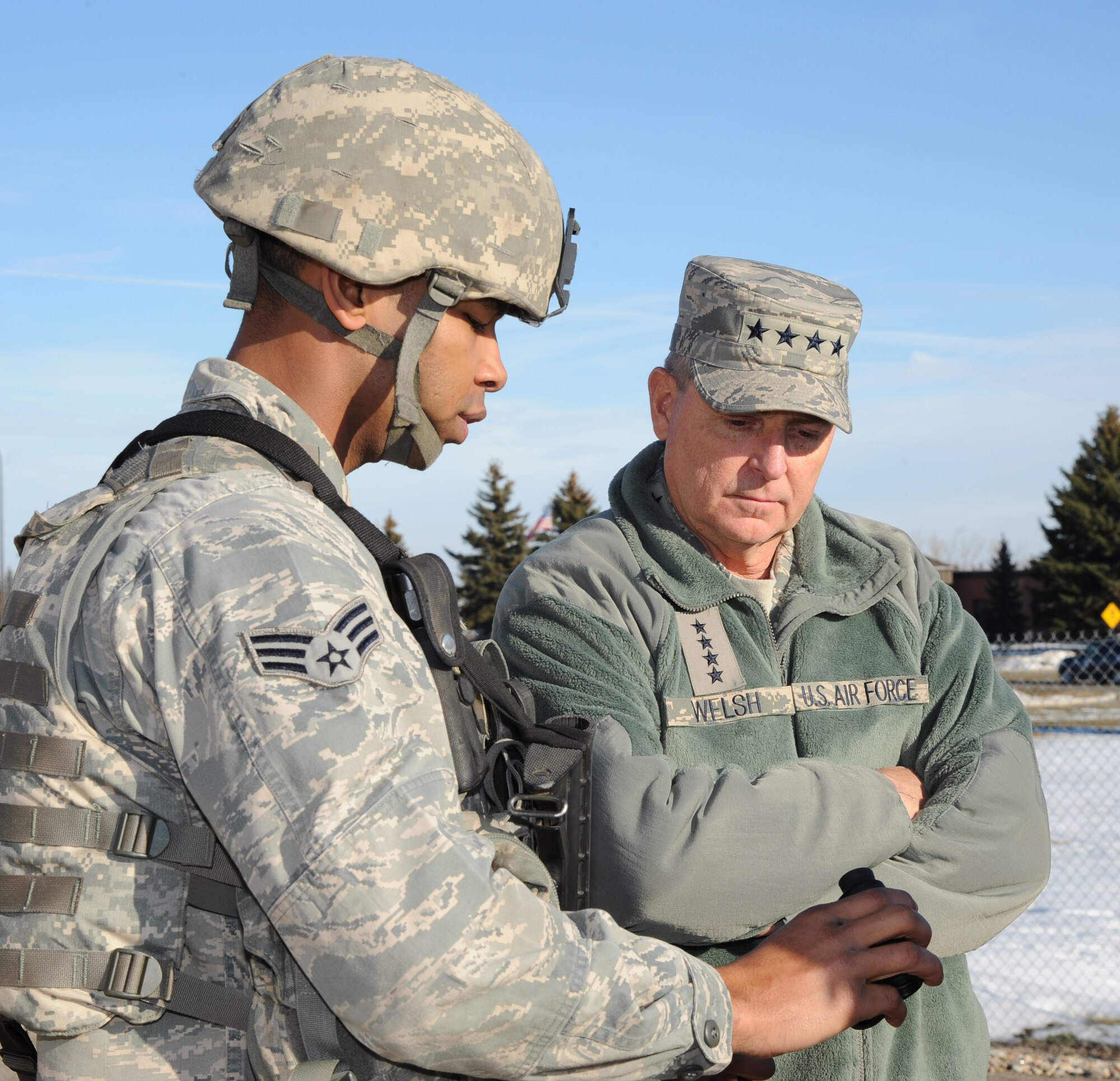 MINOT AIR FORCE BASE, N.D. -- Air Force Chief of Staff Gen. Mark A. Welsh III talks with a defender from Minot AFB during a tour of the U-01 launch facility trainer here, Nov. 21. The tour was part of Welsh’s first visit to Minot since becoming the chief of staff. (U.S. Air Force photo/Airman 1st Class Andrew Crawford)