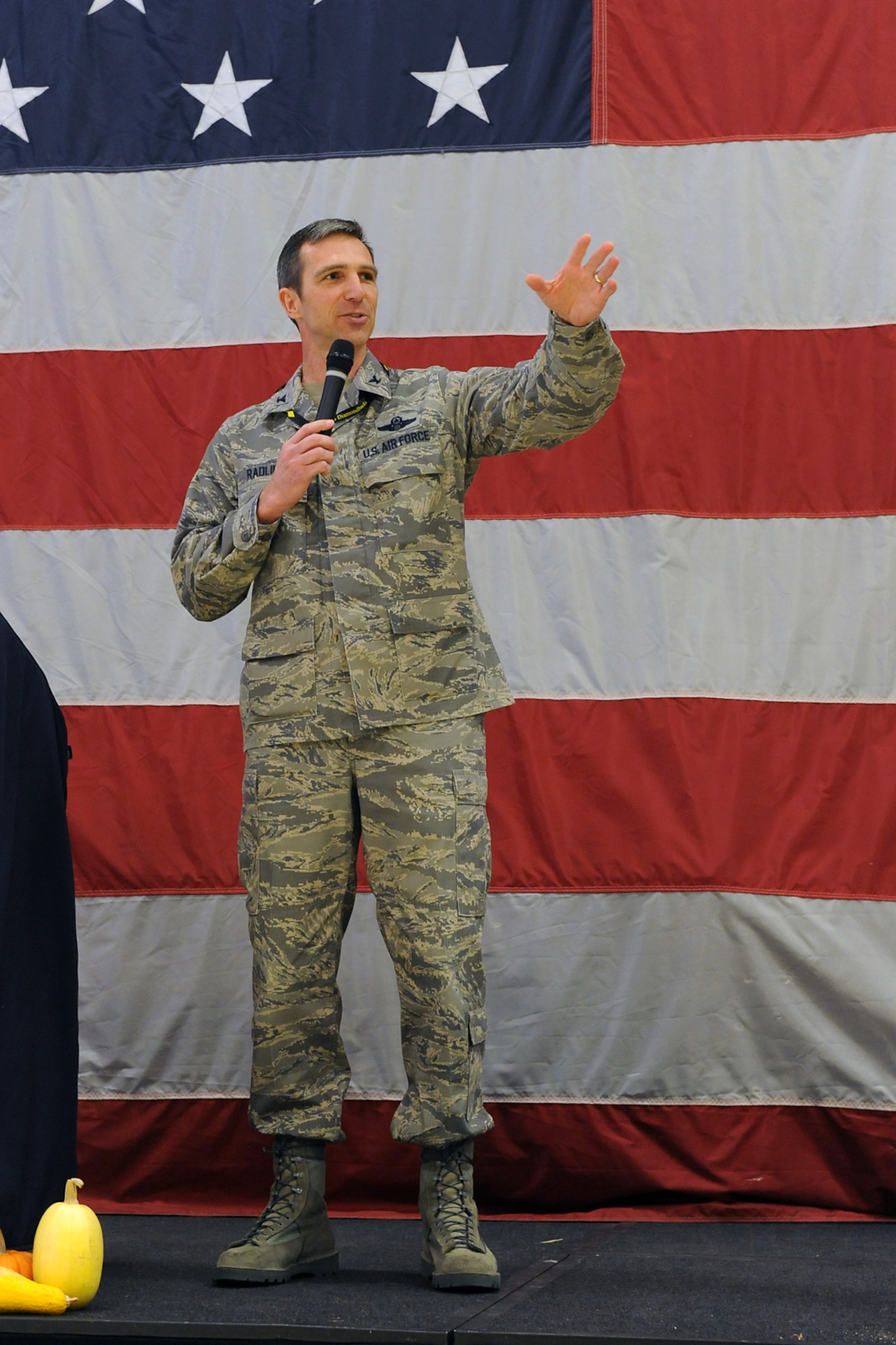Col. Bryan Radliff, 419th Fighter Wing commander, addresses Airmen from the 419th and 388th Fighter Wings before the combined Thanksgiving celebration kicked off earlier today. (U.S. Air Force photo/Alex Lloyd)