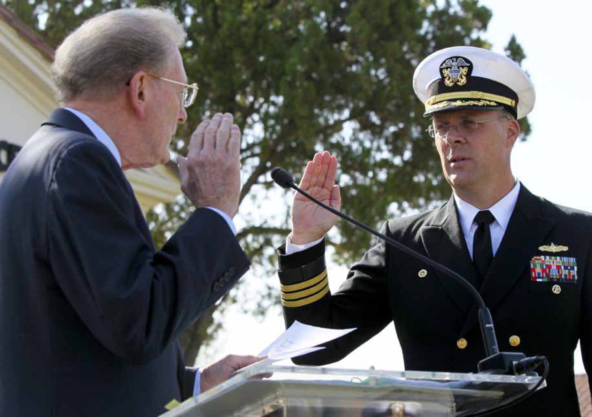 NORCO, Calif. Director, Chief of Naval Operations (CNO) Strategic Studies Group Adm. James R. Hogg (Ret.), left, administers oath of office during Naval Surface Warfare Center (NSWC), Corona Division Commanding Officer Capt. (select) Eric Ver Hage’s frocking ceremony, a Navy tradition that allows an officer qualified for promotion to wear the next-higher rank and assume associated duties until formally promoted later with corresponding pay. Attended by friends, family and the workforce, the event included a briefing for community leaders on the vital work performed at
NSWC Corona in support of national defense. (U.S. Navy photo by Greg Vojtko)
