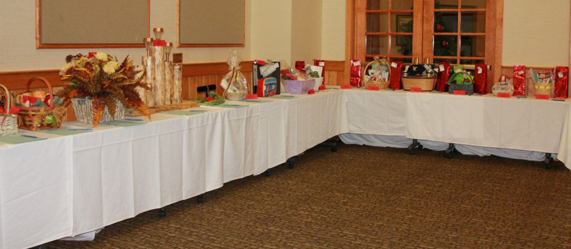 Numerous items were on display and available to bid on for a silent auction during the Mercantile Auction held on Nov. 17.  These items were only available for the silent auction, as others were up for auction during the live auction at the event.  (U.S. Air Force Courtesy photo)  