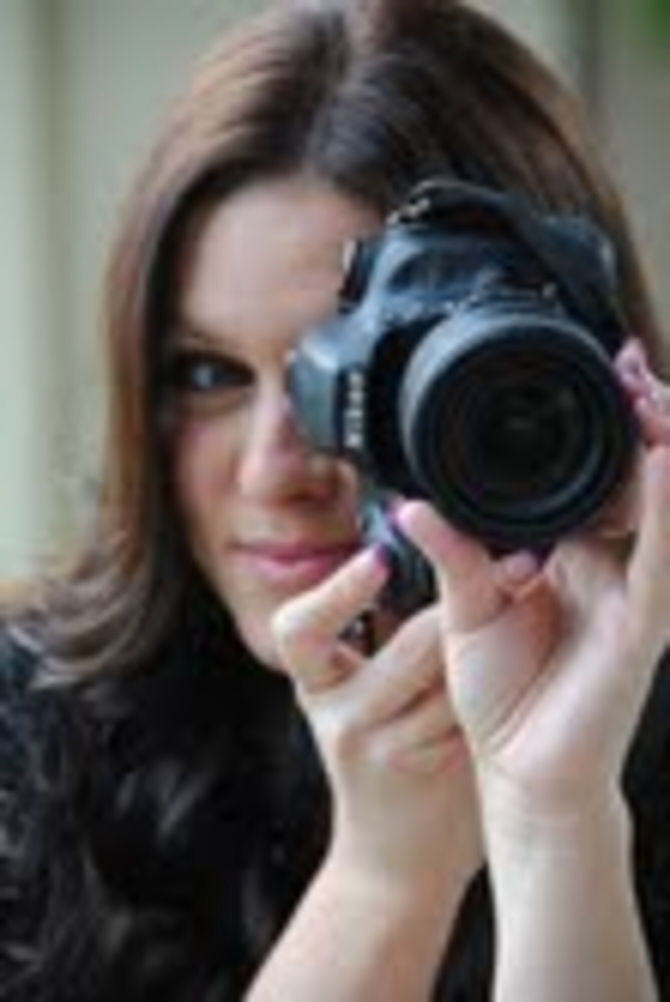 Brianna Gamble, military spouse and former Airman, poses for a portrait Nov. 19. Gamble has created a calendar using her business and photography skills to raise funds for the Vacaville Opportunity House. (U.S. Air Force photo/Airman 1st Class Madelyn Brown)